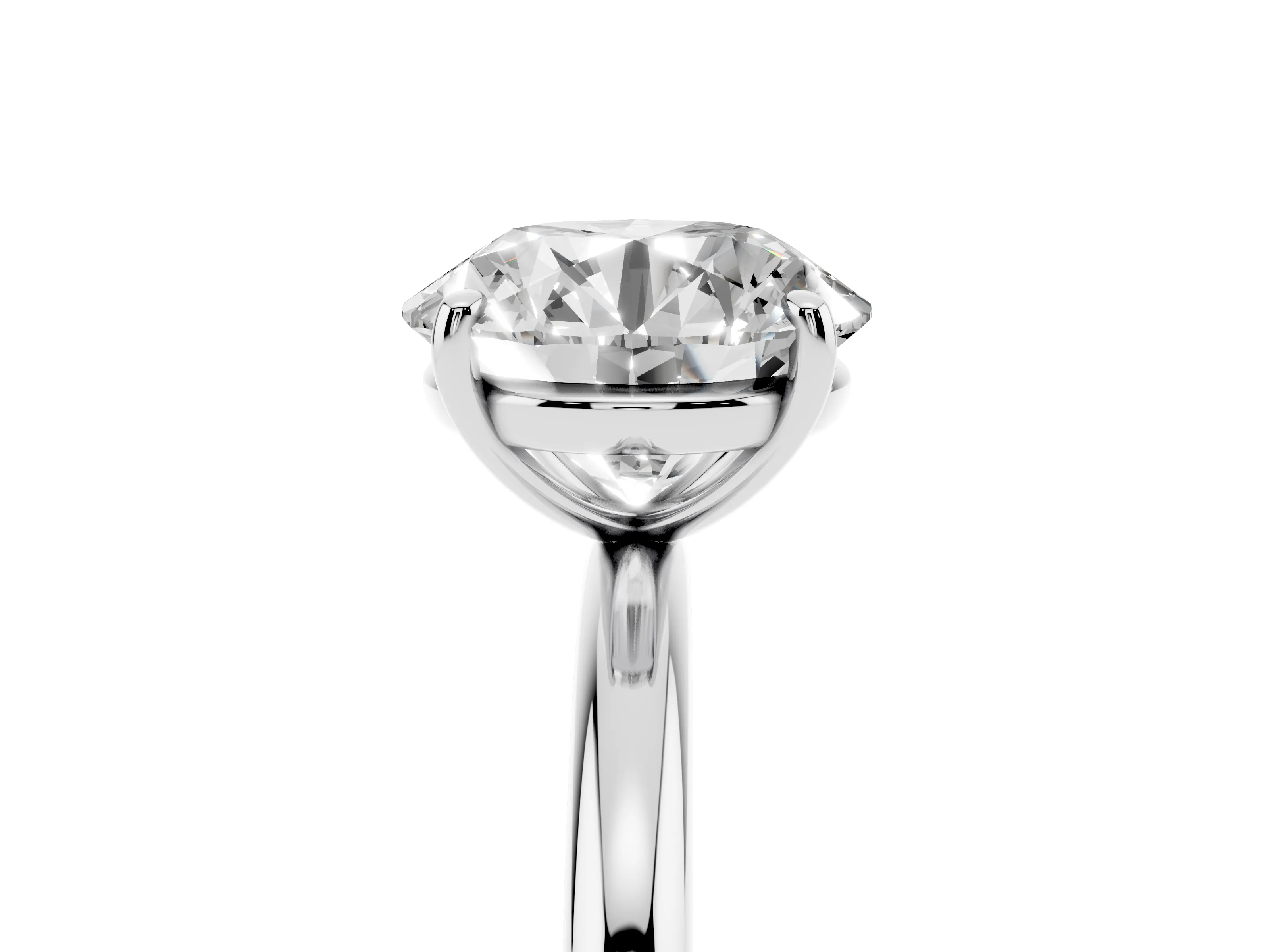 Round Cut Diamond Solitaire Ring Set in Silver with Prong Setting on a Polished Plain Band