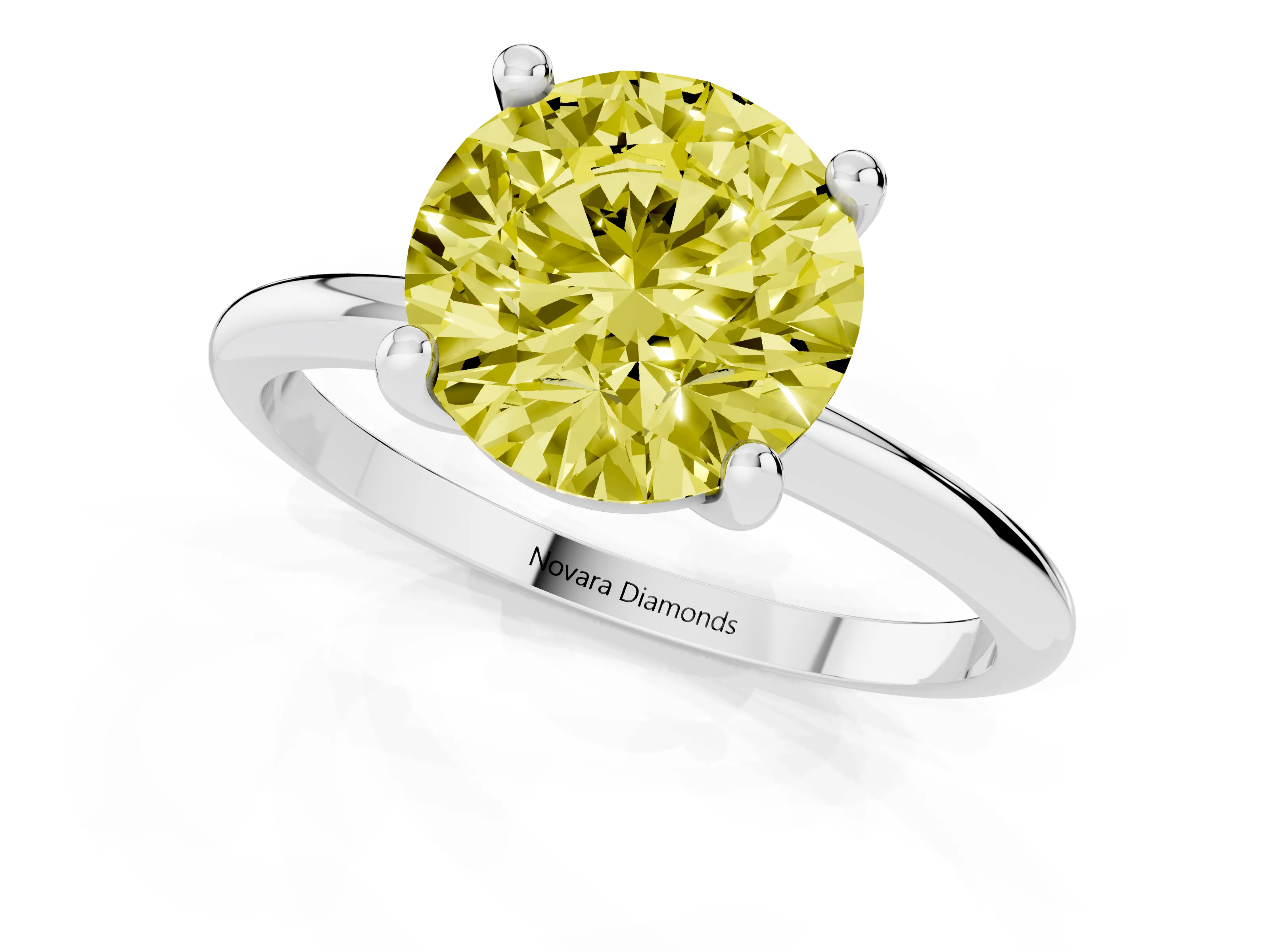 Fancy Yellow Round Cut Diamond Solitaire Ring Set in Silver with Secure Prong Setting on a Classic Band
