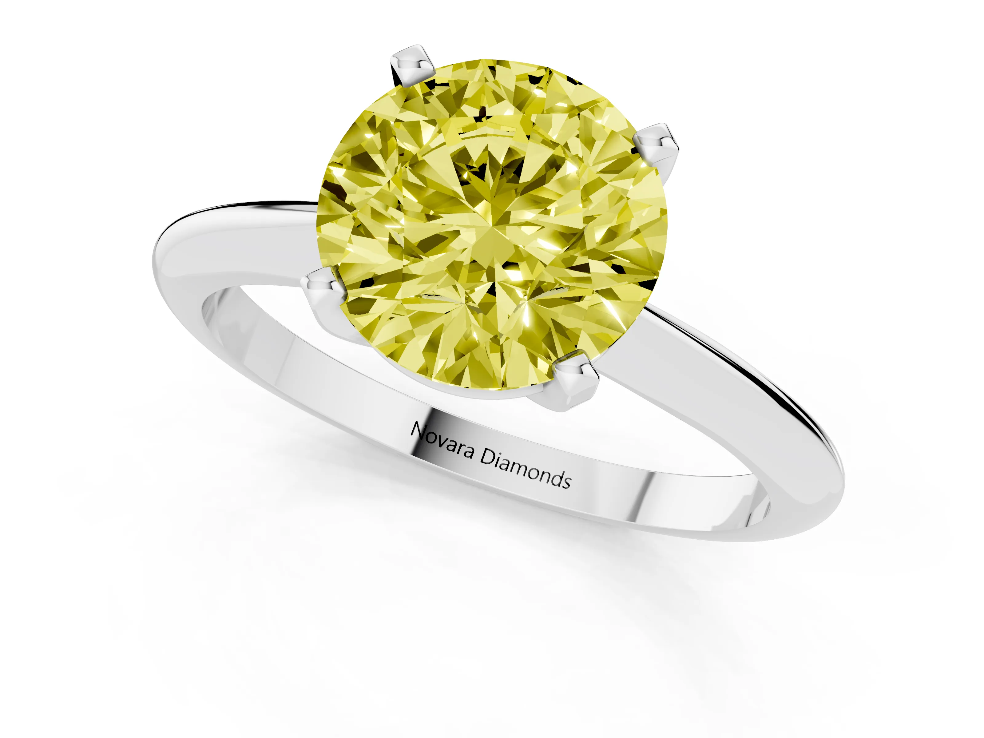 Fancy Yellow Round Cut Diamond Solitaire Ring Set in White gold with Prong Setting on a Plain Round Band