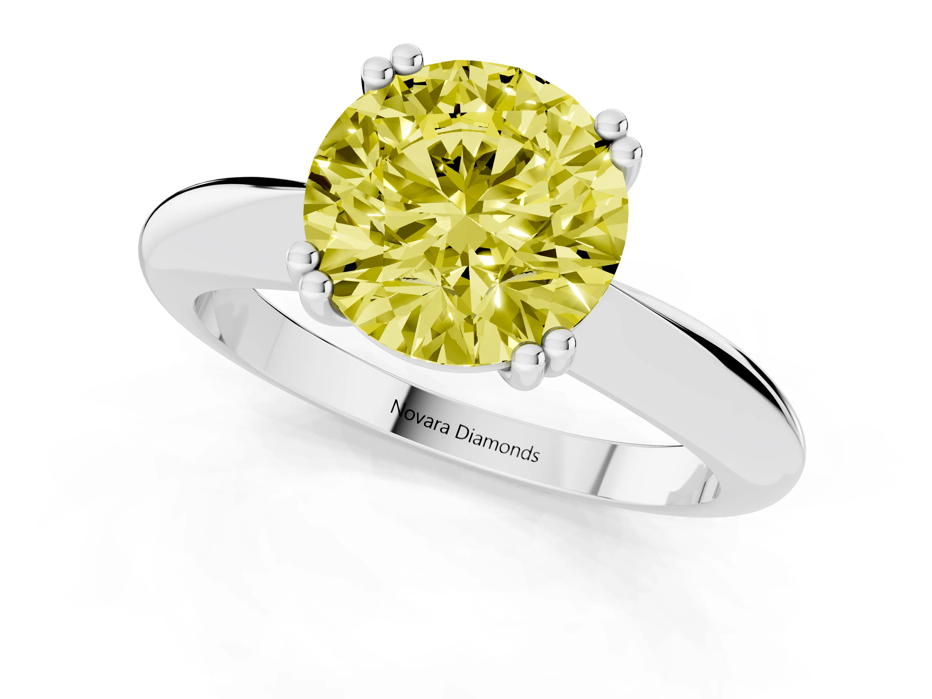 Fancy Yellow Round Cut Diamond Solitaire Engagement Ring Set in White gold with Tapered Band and Prong Setting