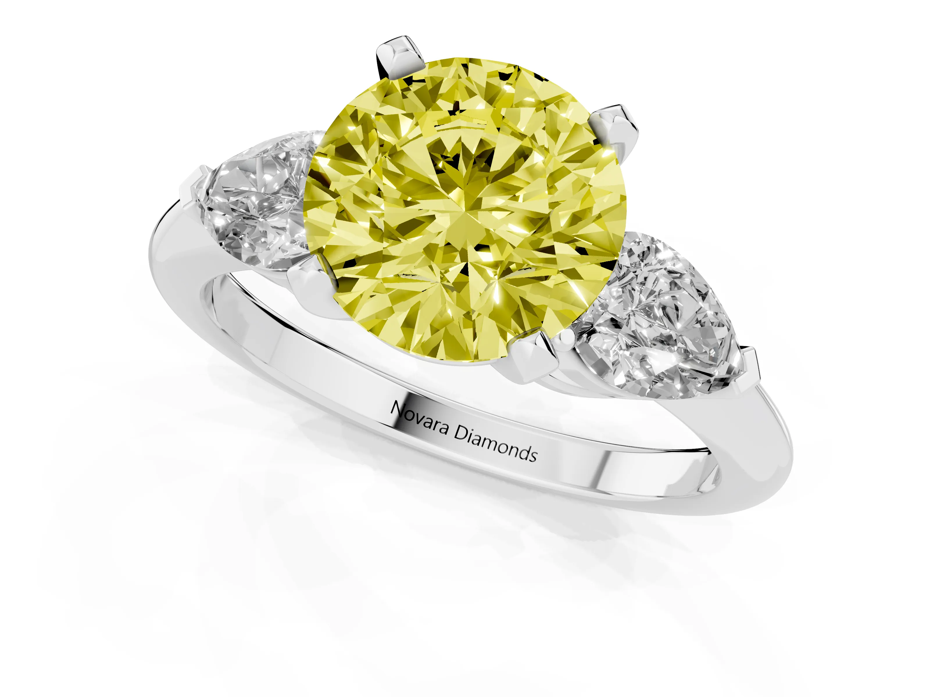 Fancy Yellow Three-Stone Round Cut Diamond Ring Set in Platinum with Pear Side Stones and Prong Setting