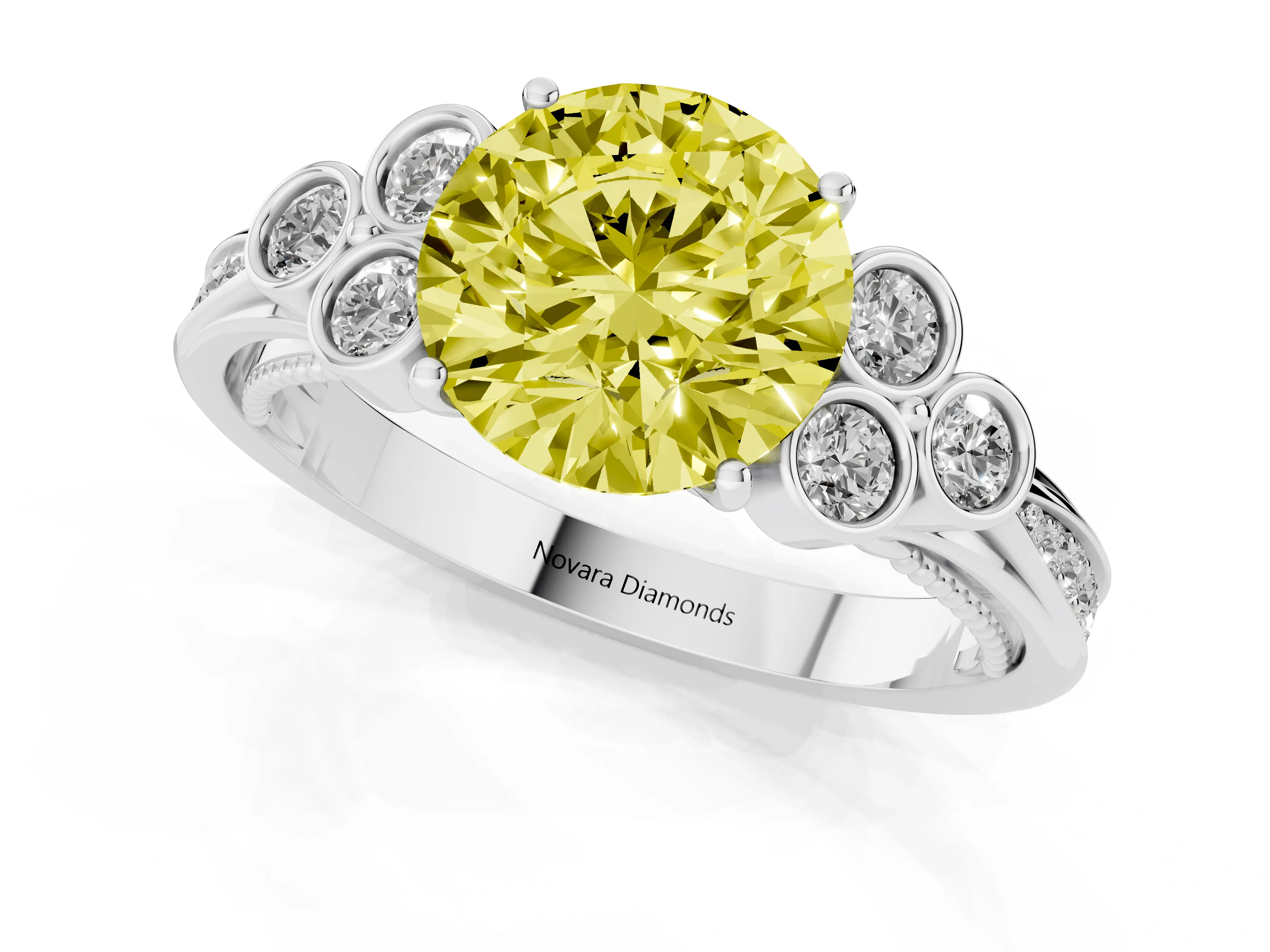 Fancy Yellow Round Cut Diamond Engagement Ring Set in White gold with Bezel Set Round Side Stones and Prong Setting
