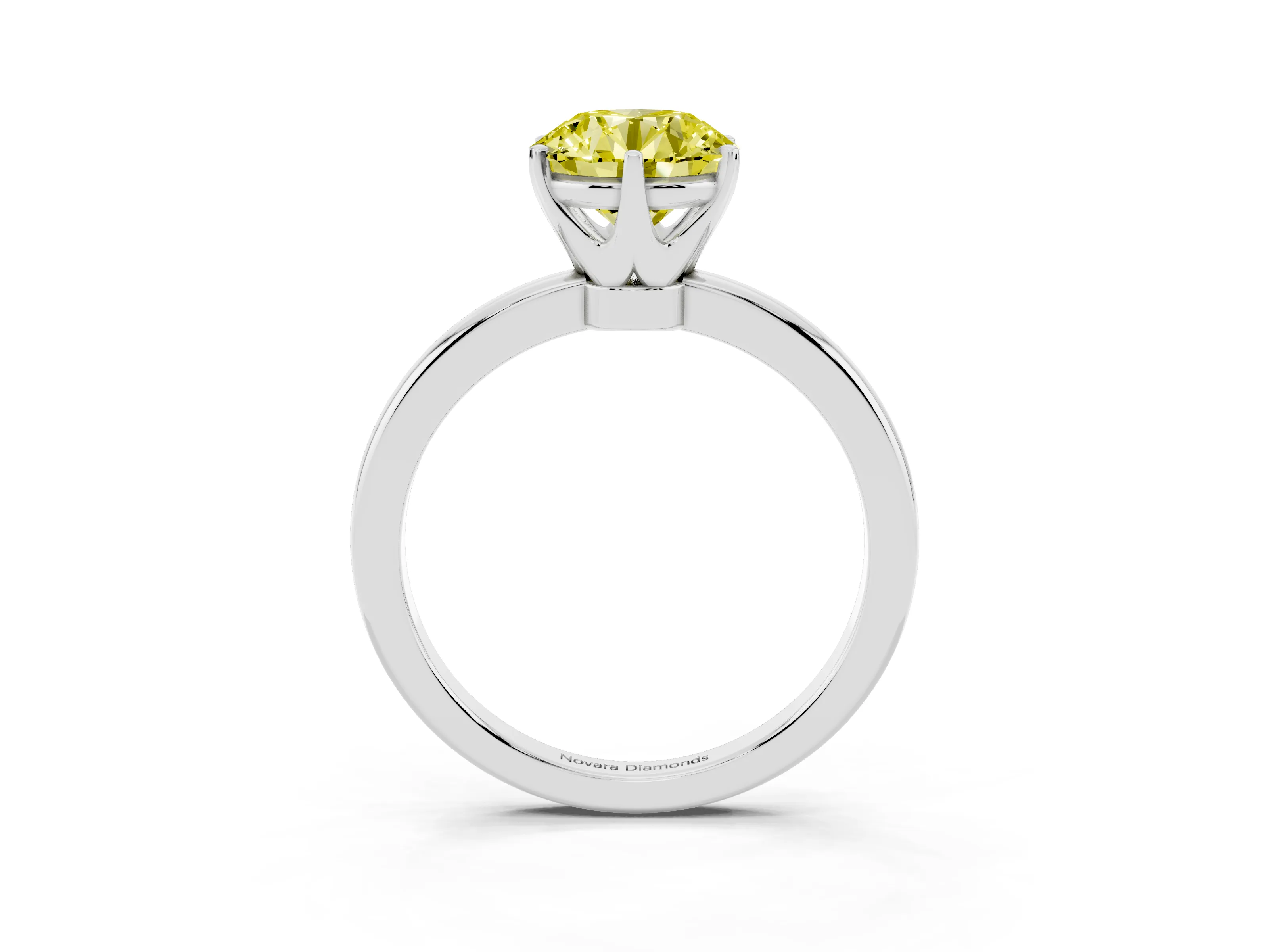 Fancy Yellow Round Cut Diamond Solitaire Ring Set in Platinum with Raised Prong Setting on a Classic Band