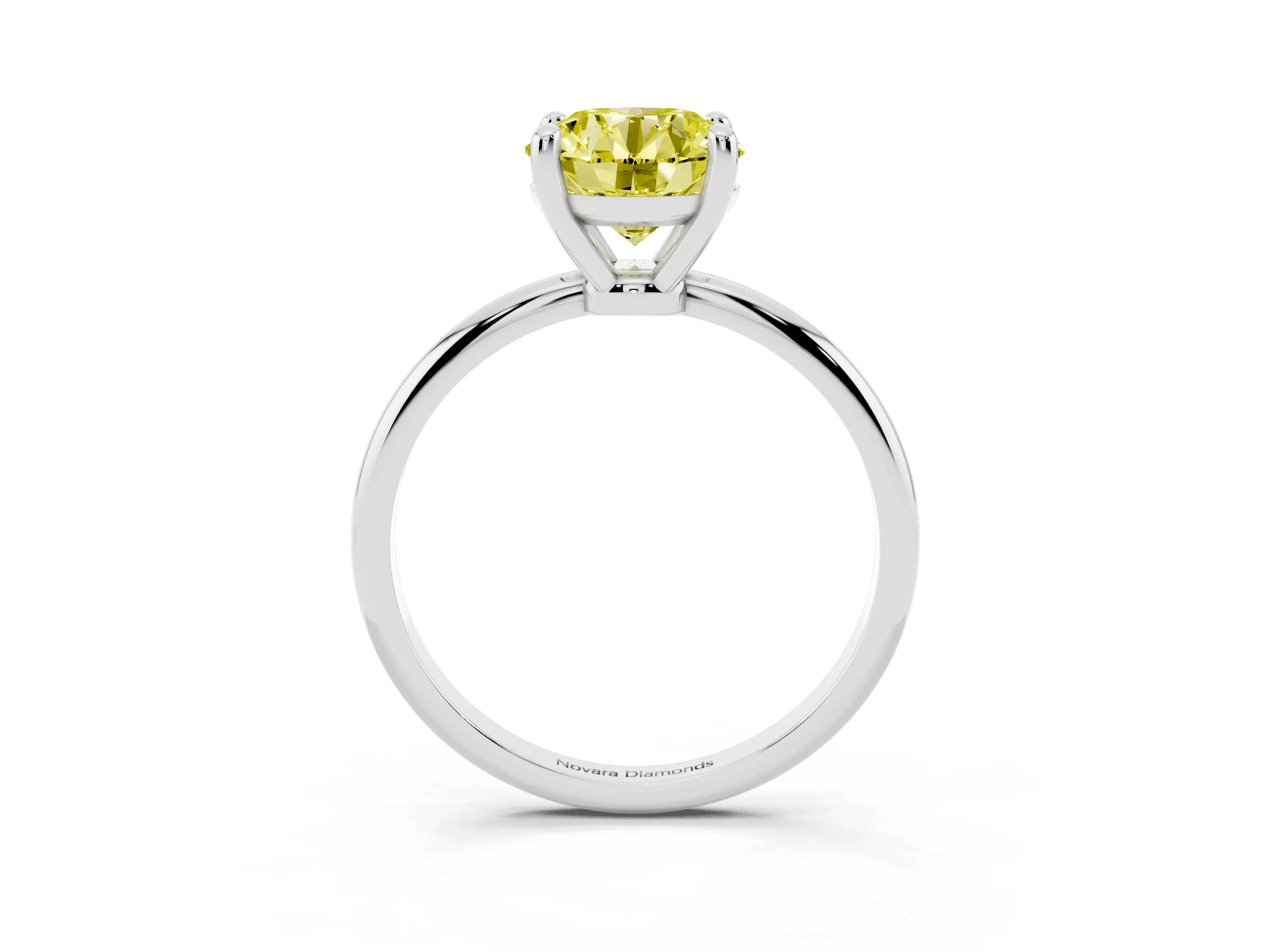 Fancy Yellow Round Cut Diamond Solitaire Ring Set in Silver with Secure Prong Setting on a Classic Band