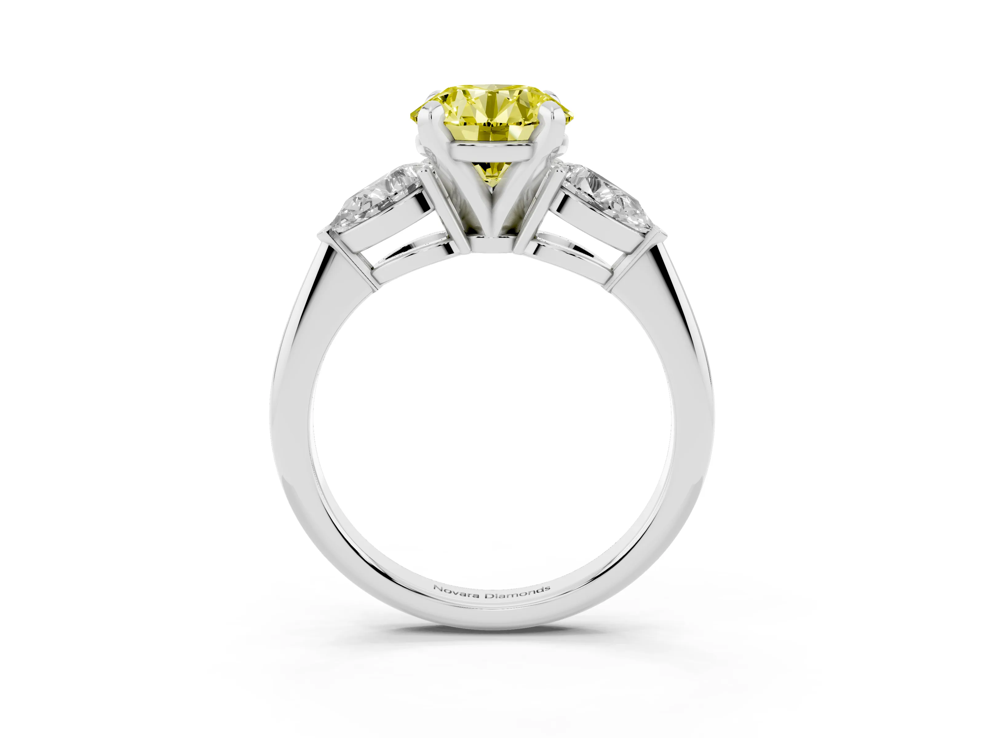 Fancy Yellow Three-Stone Round Cut Diamond Ring Set in Platinum with Pear Side Stones and Prong Setting