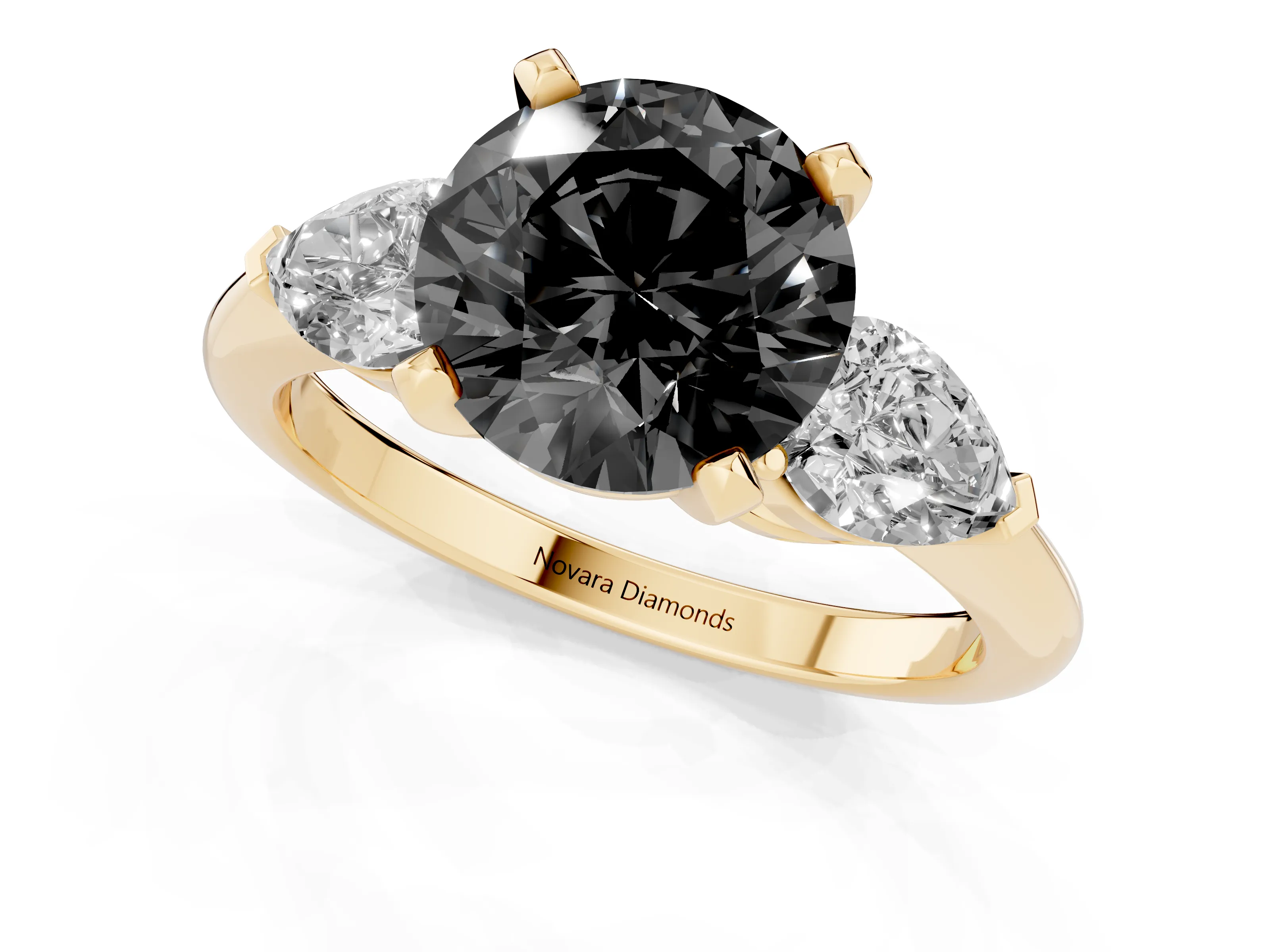 Fancy Black Three-Stone Round Cut Diamond Ring Set in Yellow gold with Pear Side Stones and Prong Setting
