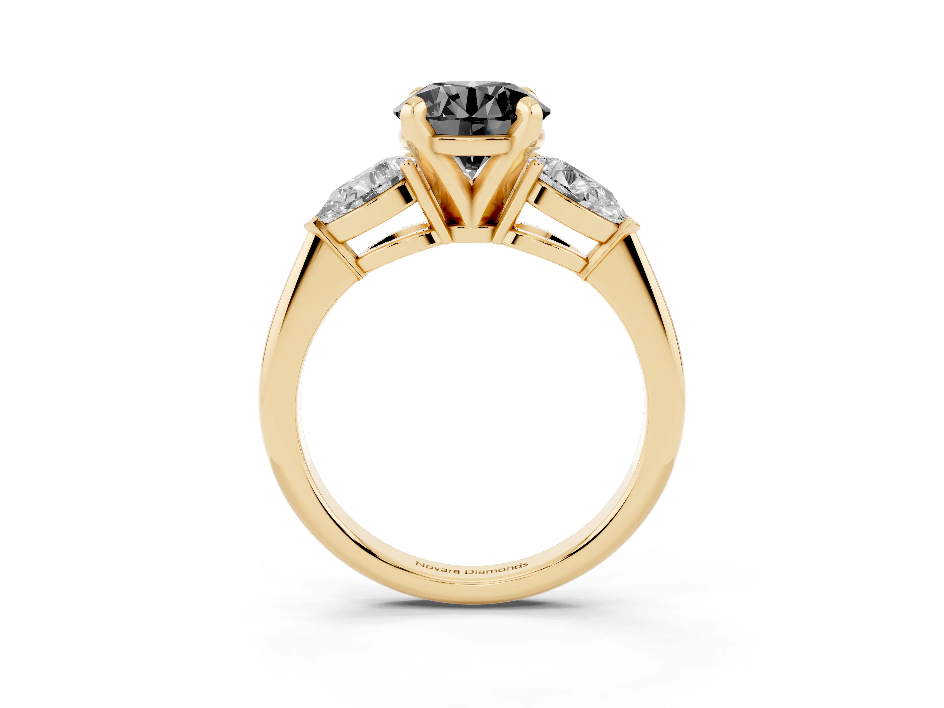 Fancy Black Three-Stone Round Cut Diamond Ring Set in Yellow gold with Pear Side Stones and Prong Setting