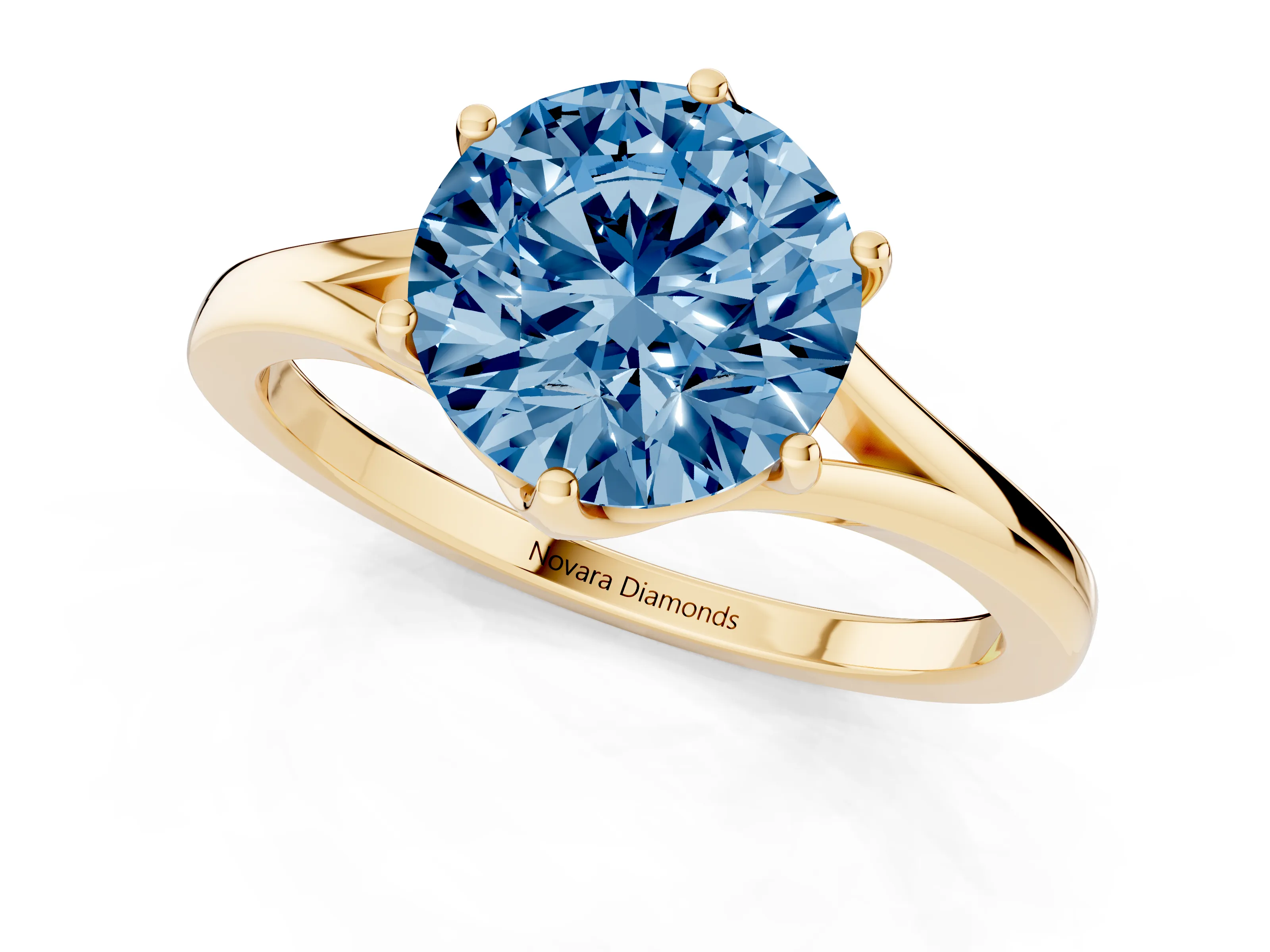 Fancy Blue Round Cut Diamond Solitaire Ring Set in Yellow gold with Polished Tapered Band and Prong Setting