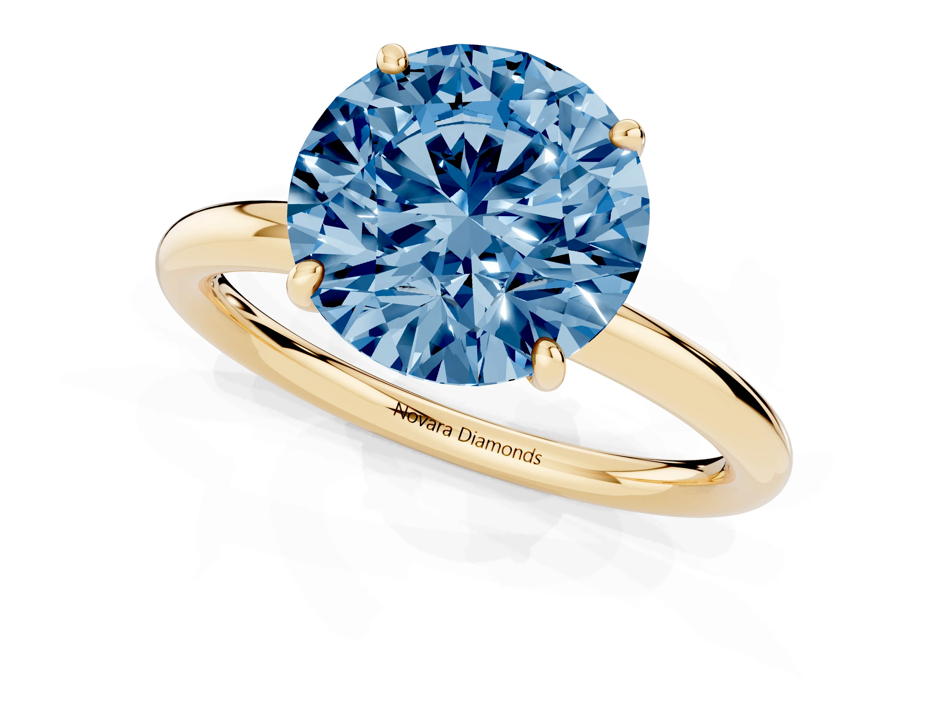 Fancy Blue Round Cut Diamond Solitaire Ring Set in Yellow gold with Prong Setting on a Polished Plain Band