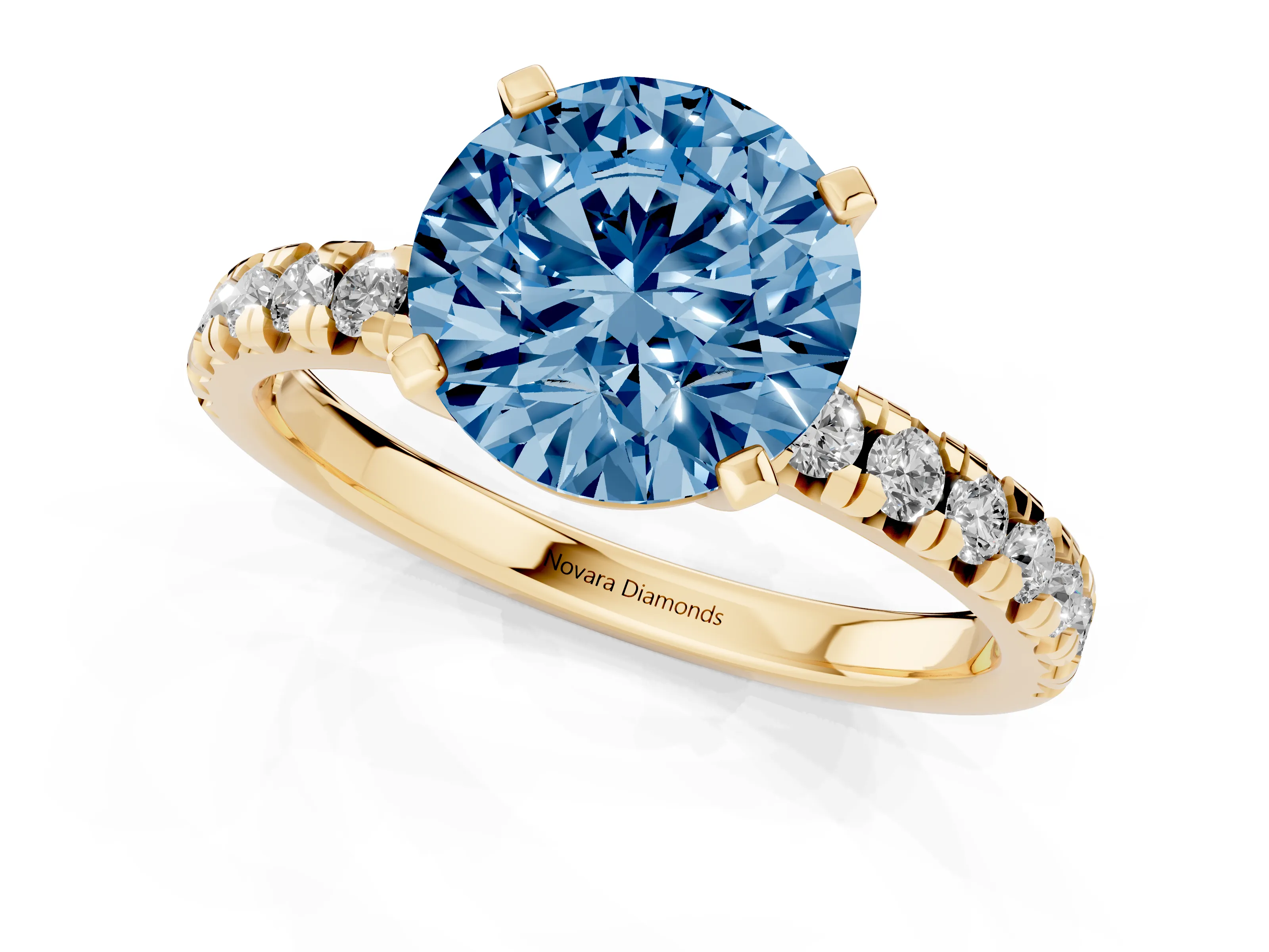 Fancy Blue Round Cut Diamond Solitaire Pavé Engagement Ring Set in Yellow gold with Round Band and Prong Setting