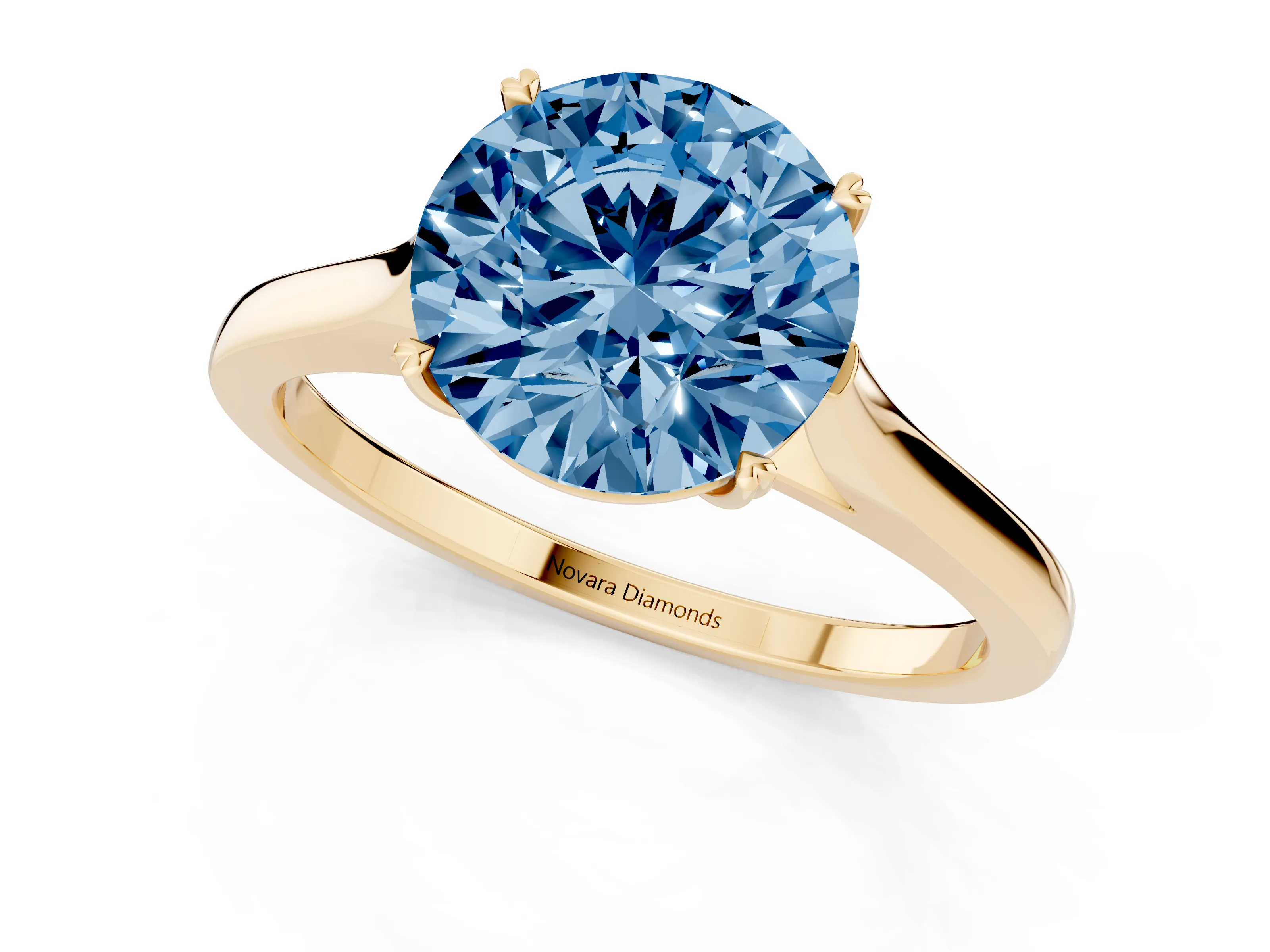 Fancy Blue Round Cut Diamond Solitaire Heart Prong Engagement Ring Set in Yellow gold with Tapered Band