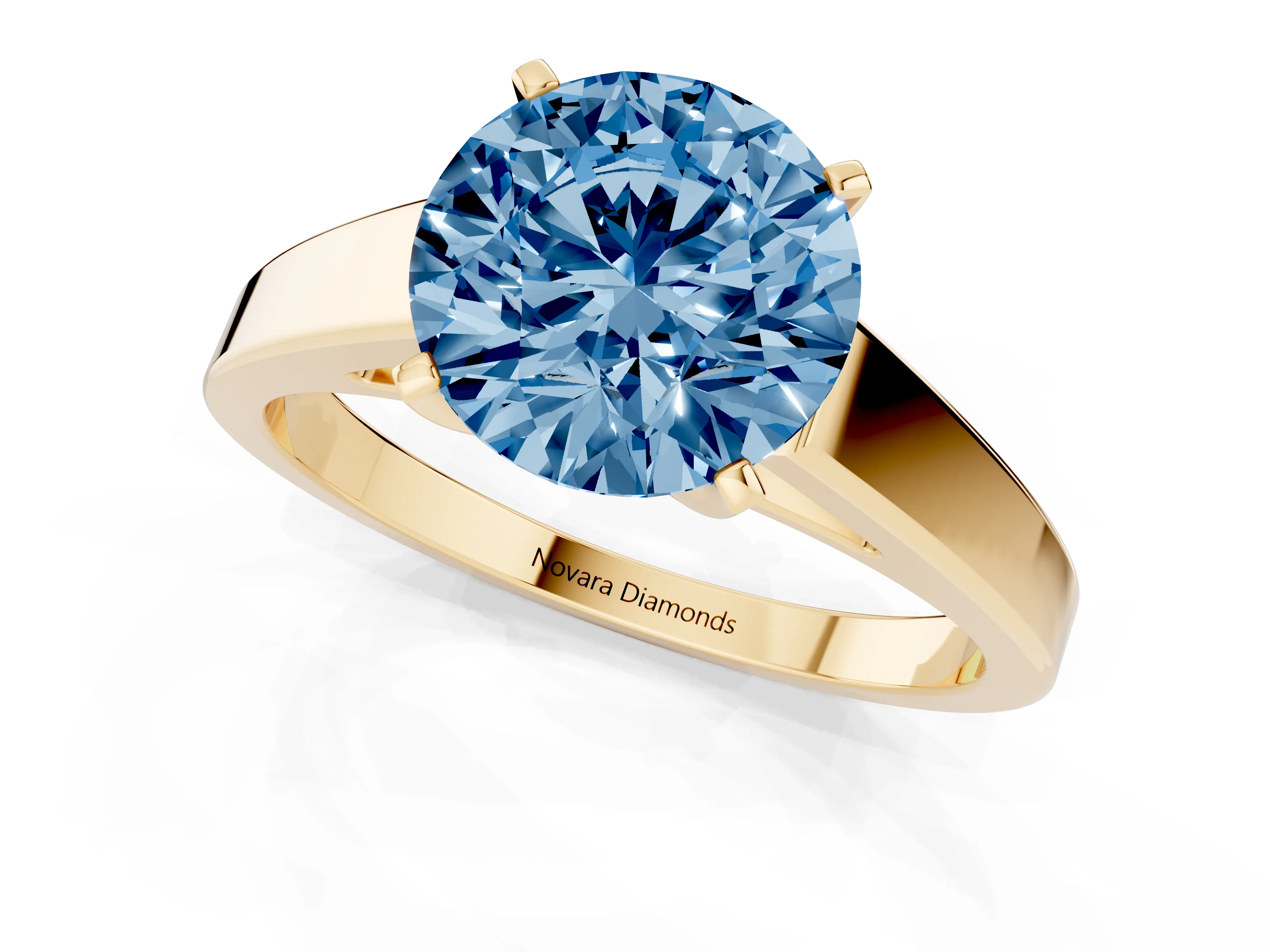 Fancy Blue Round Cut Diamond Solitaire Engagement Ring Set in Yellow gold with Prong Setting and Tapered Band