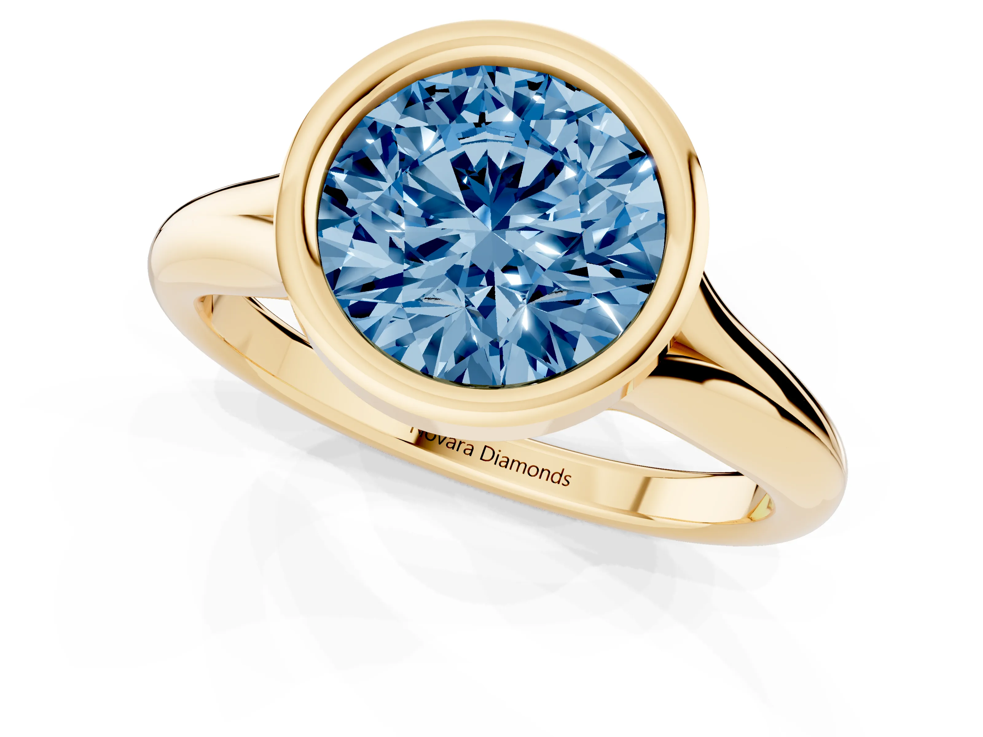 Fancy Blue Bezel Set Round Cut Diamond Solitaire Ring Set in Yellow gold with Smooth Band