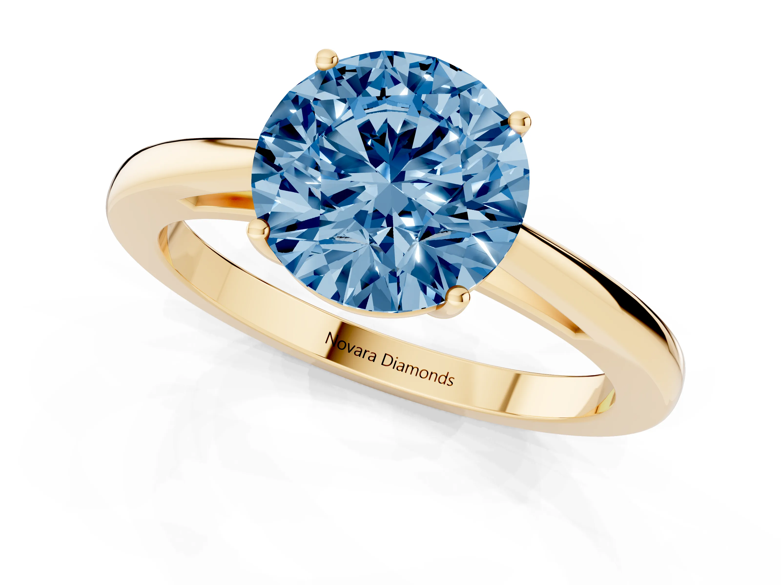 Fancy Blue Round Cut Diamond Solitaire Ring Set in Yellow gold with Split Shank and Prong Setting