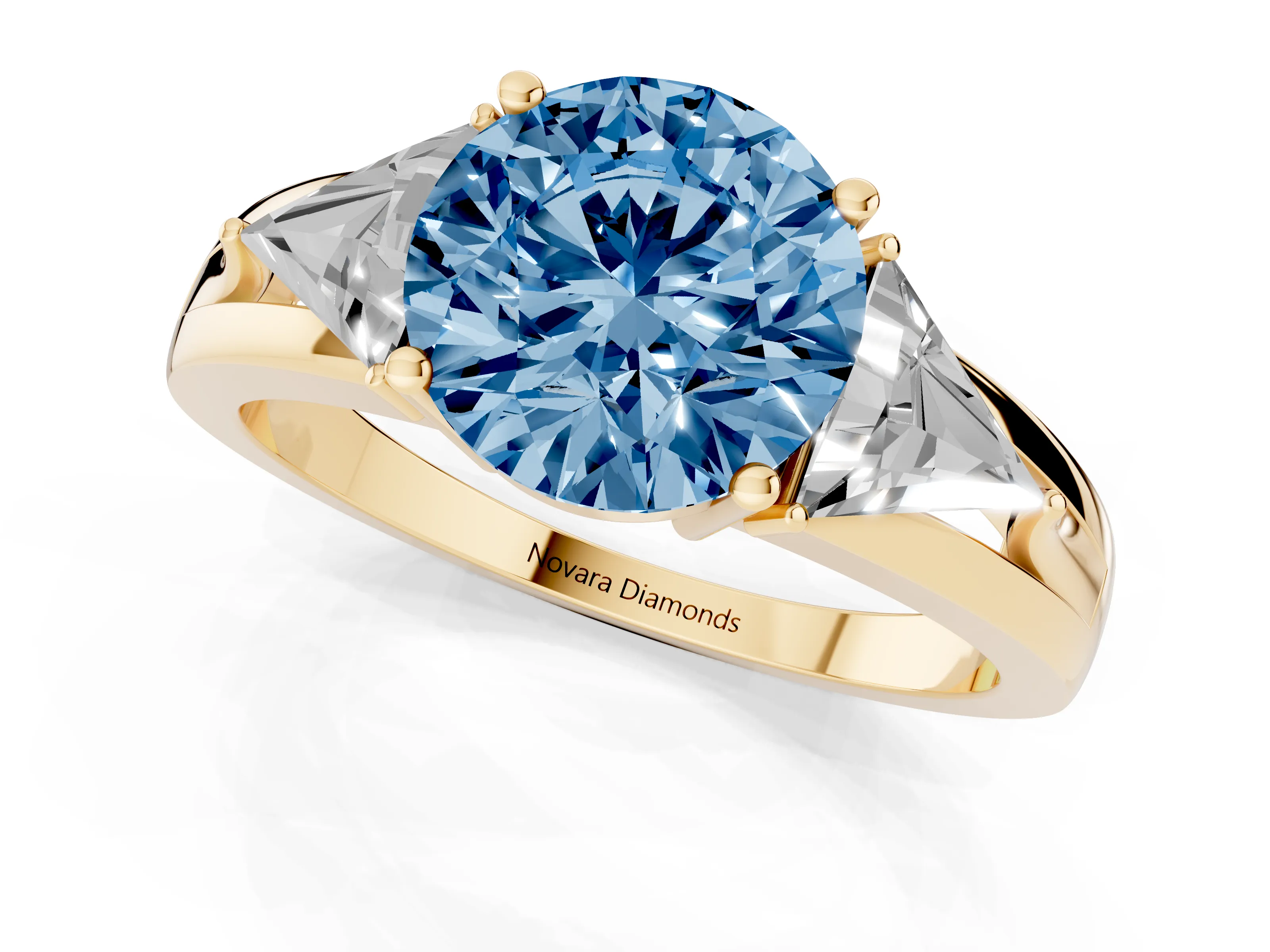 Fancy Blue Round Cut Diamond Three-Stone Ring Set in Yellow gold with Trillion Side Stones and Split Shank