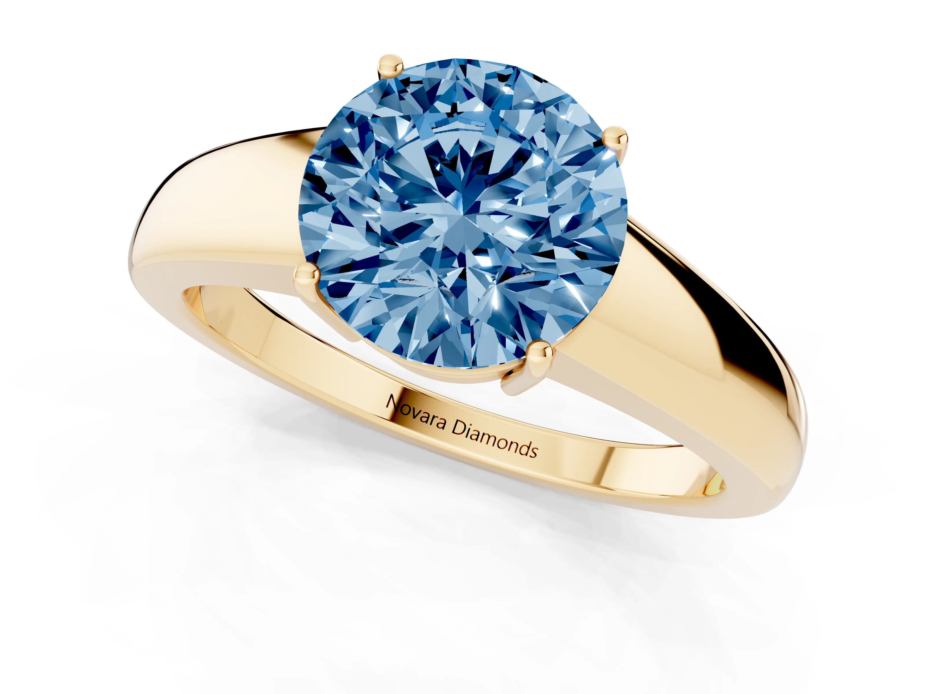 Fancy Blue Round Cut Diamond Solitaire Ring Set in Yellow gold with Tapered Band and Prong Setting