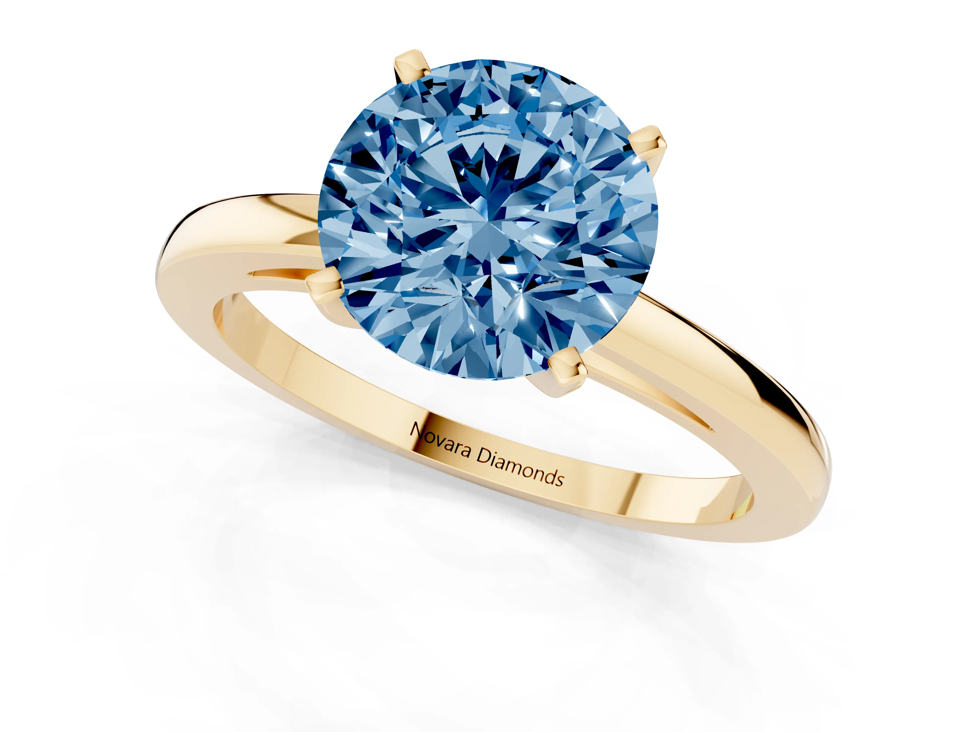 Fancy Blue Round Cut Diamond Solitaire Engagement Ring Set in Yellow gold with Prong Setting on a Classic Band