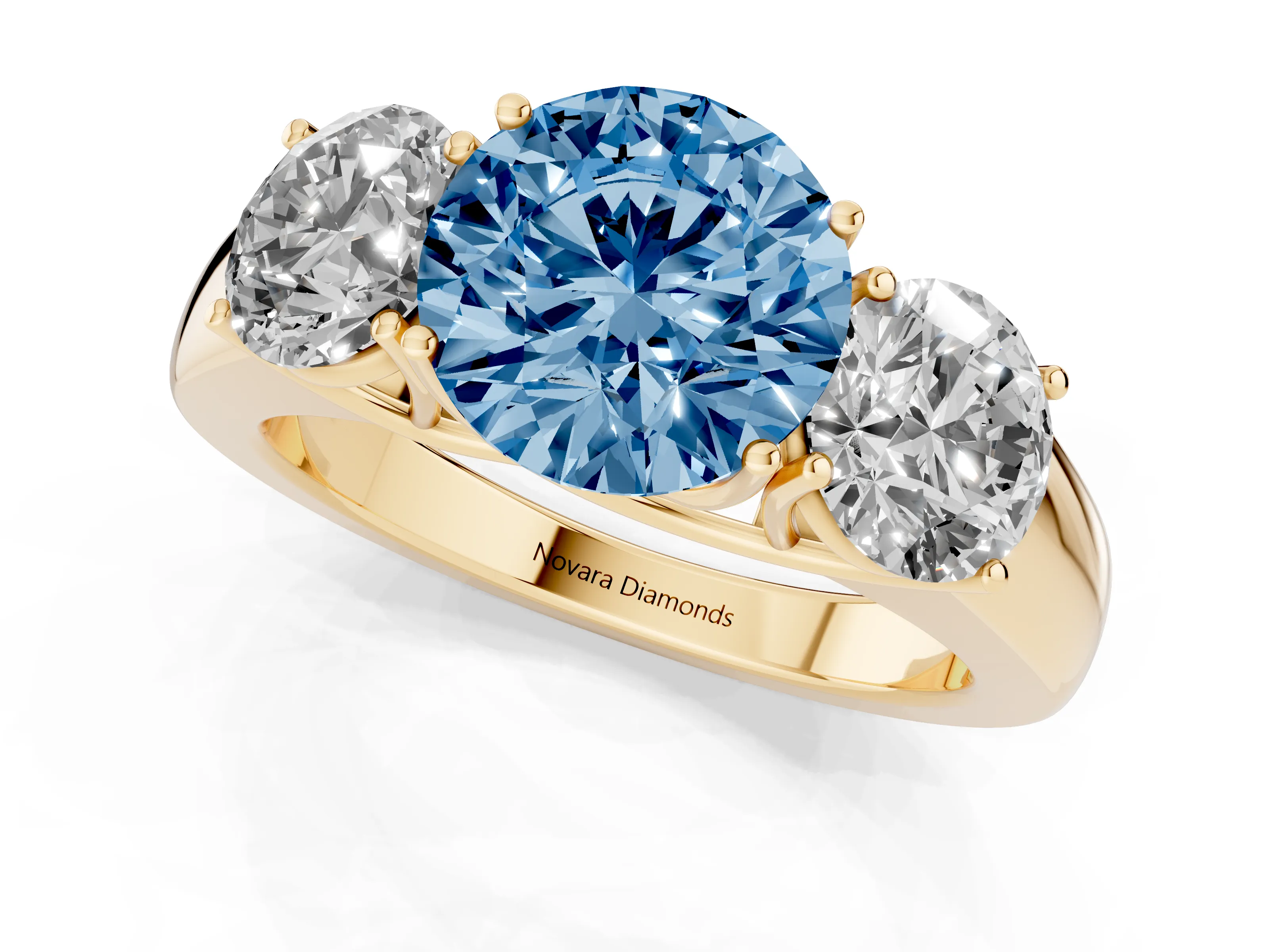 Fancy Blue Three-Stone Round Cut Diamond Ring Set in Yellow gold with Matching Prong Settings and Plain Band