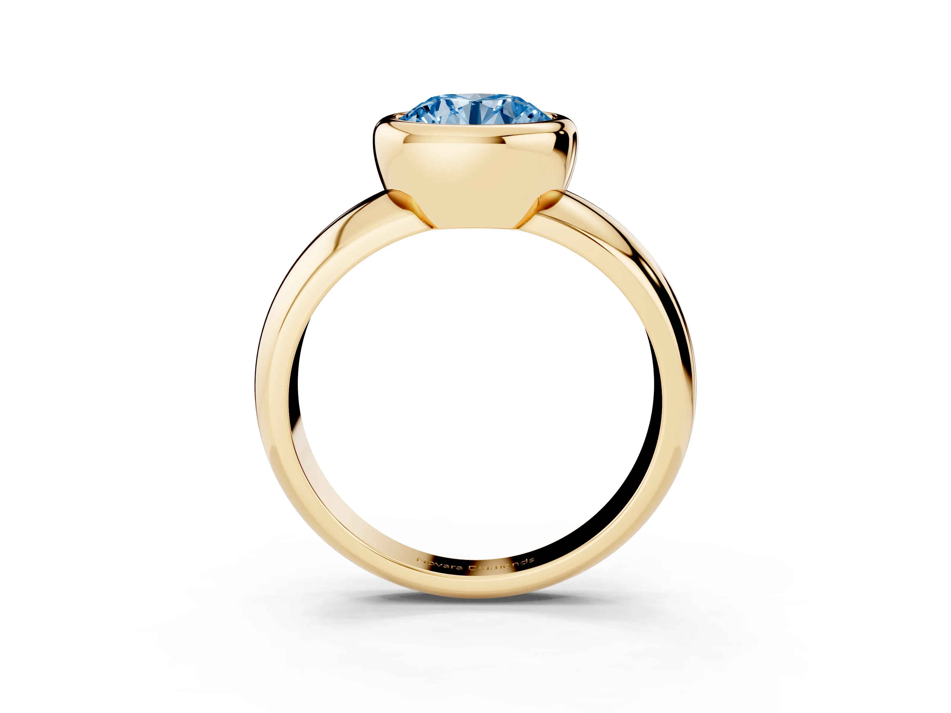 Fancy Blue Bezel Set Round Cut Diamond Solitaire Ring Set in Yellow gold with Wide Band