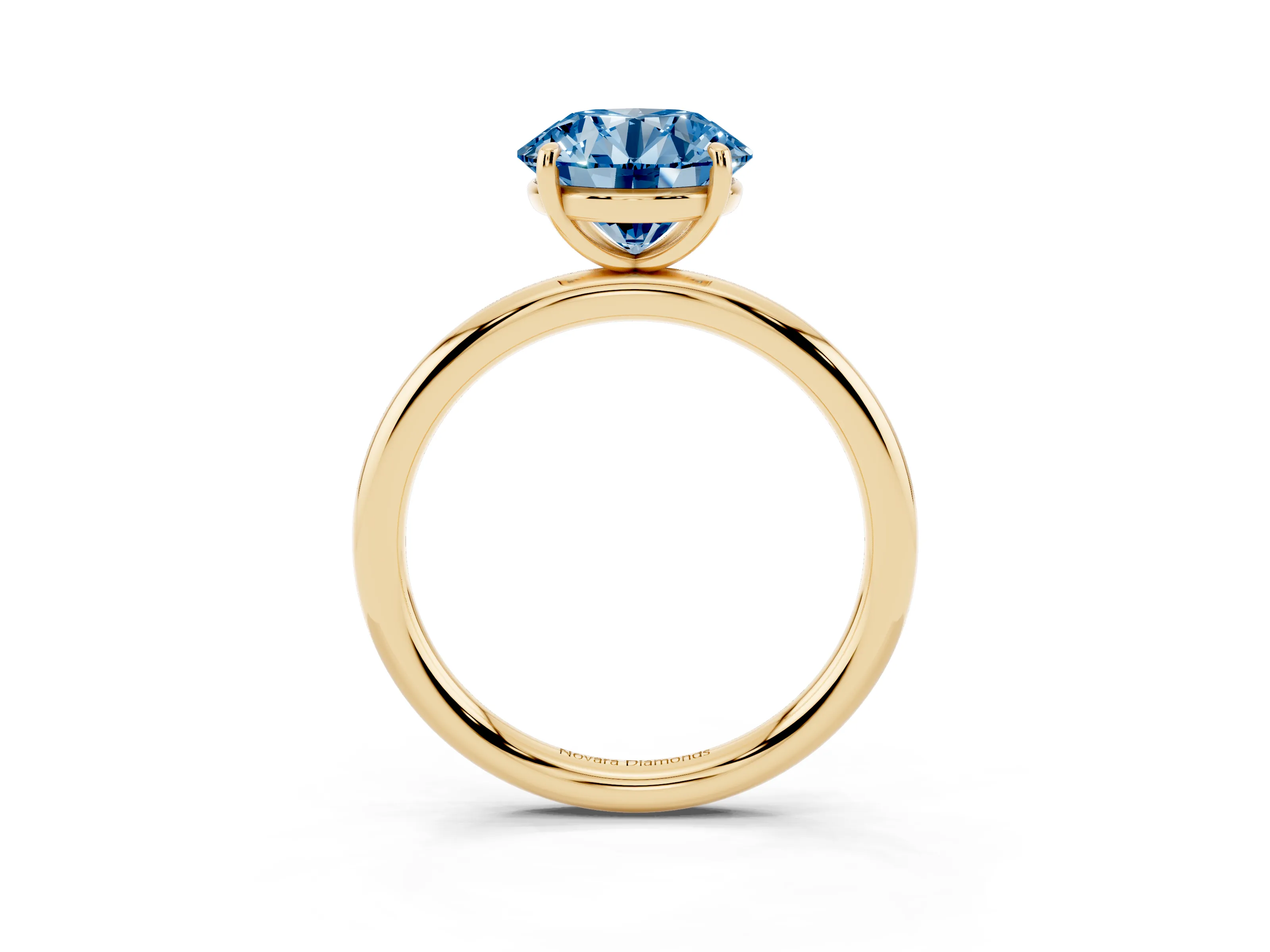 Fancy Blue Round Cut Diamond Solitaire Ring Set in Yellow gold with Prong Setting on a Polished Plain Band