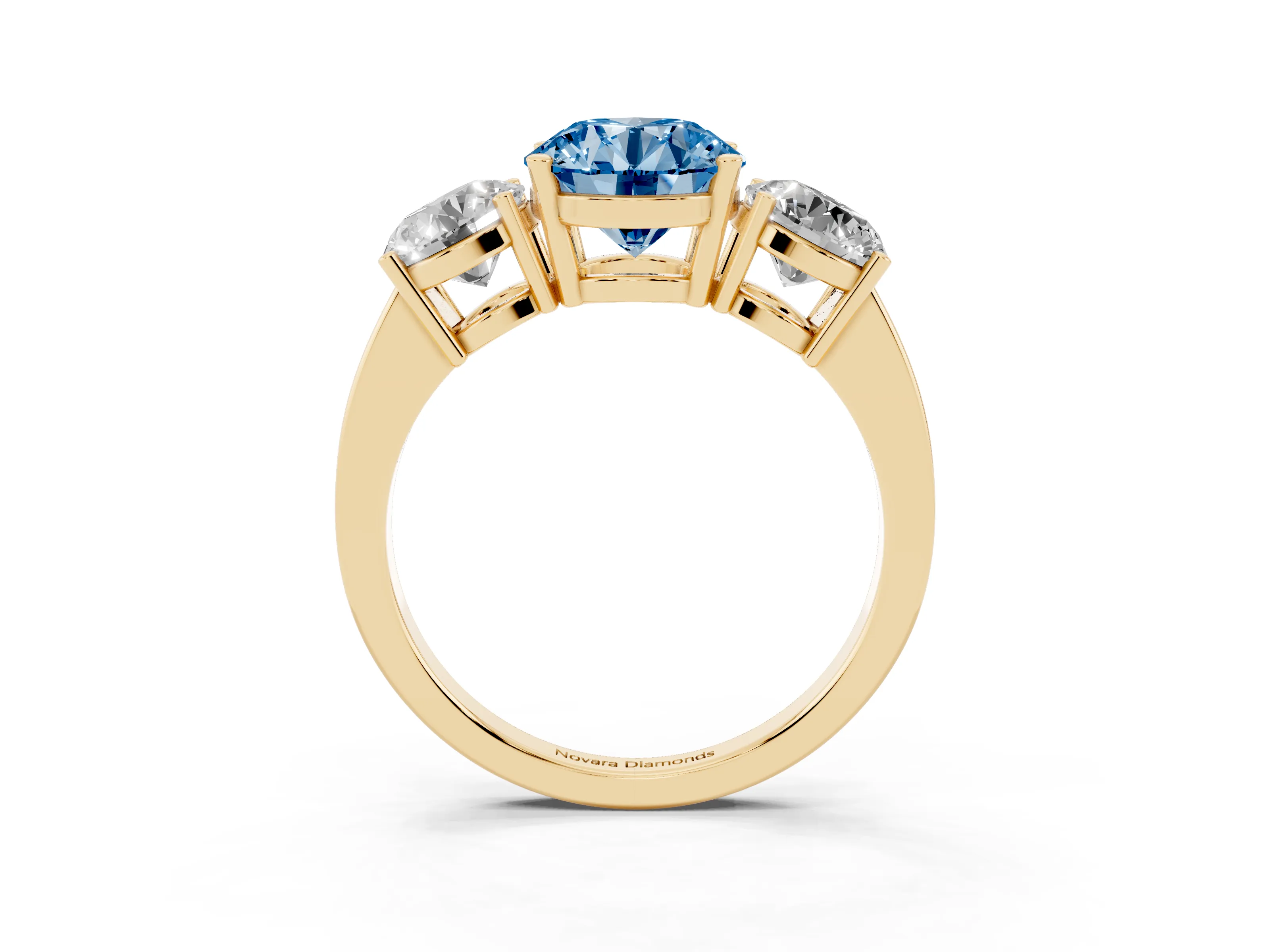 Fancy Blue Round Cut Diamond Three-Stone Engagement Ring Set in Yellow gold with Flat Band