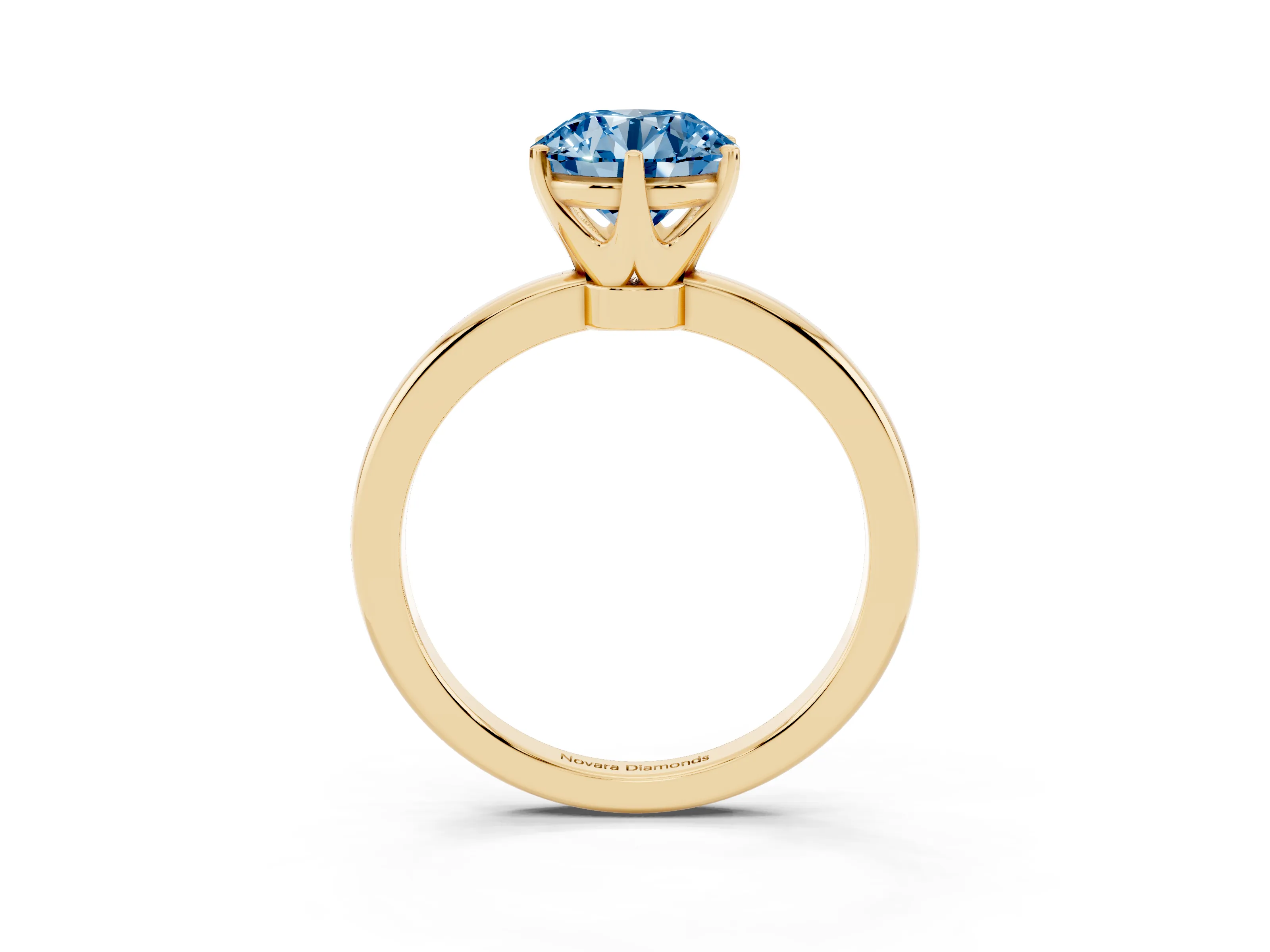Fancy Blue Round Cut Diamond Solitaire Ring Set in Yellow gold with Raised Prong Setting on a Classic Band