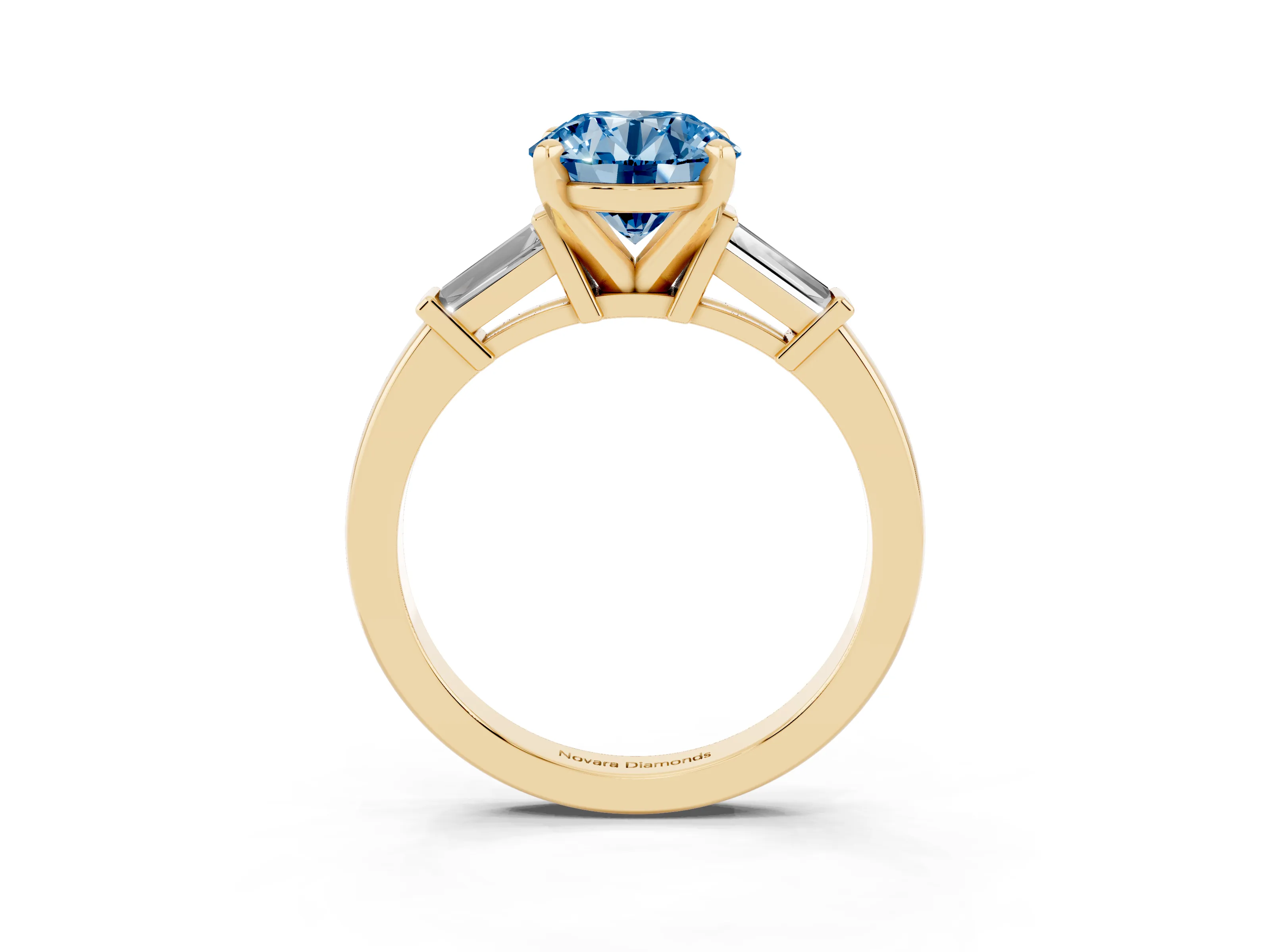 Fancy Blue Round Cut Diamond Solitaire Ring Set in Yellow gold with Tapered Baguette Accents and Prong Setting
