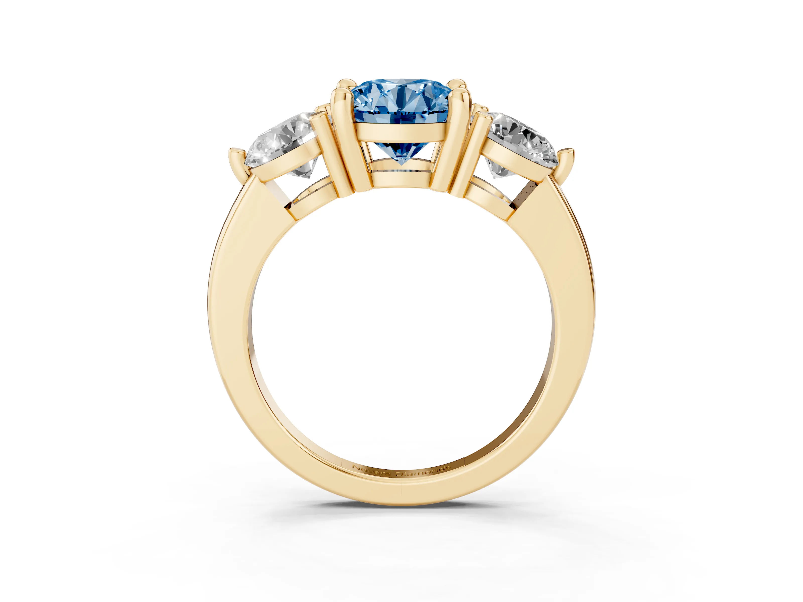 Fancy Blue Round Cut Diamond Three-Stone Ring Set in Yellow gold with Prong Setting and Classic Band