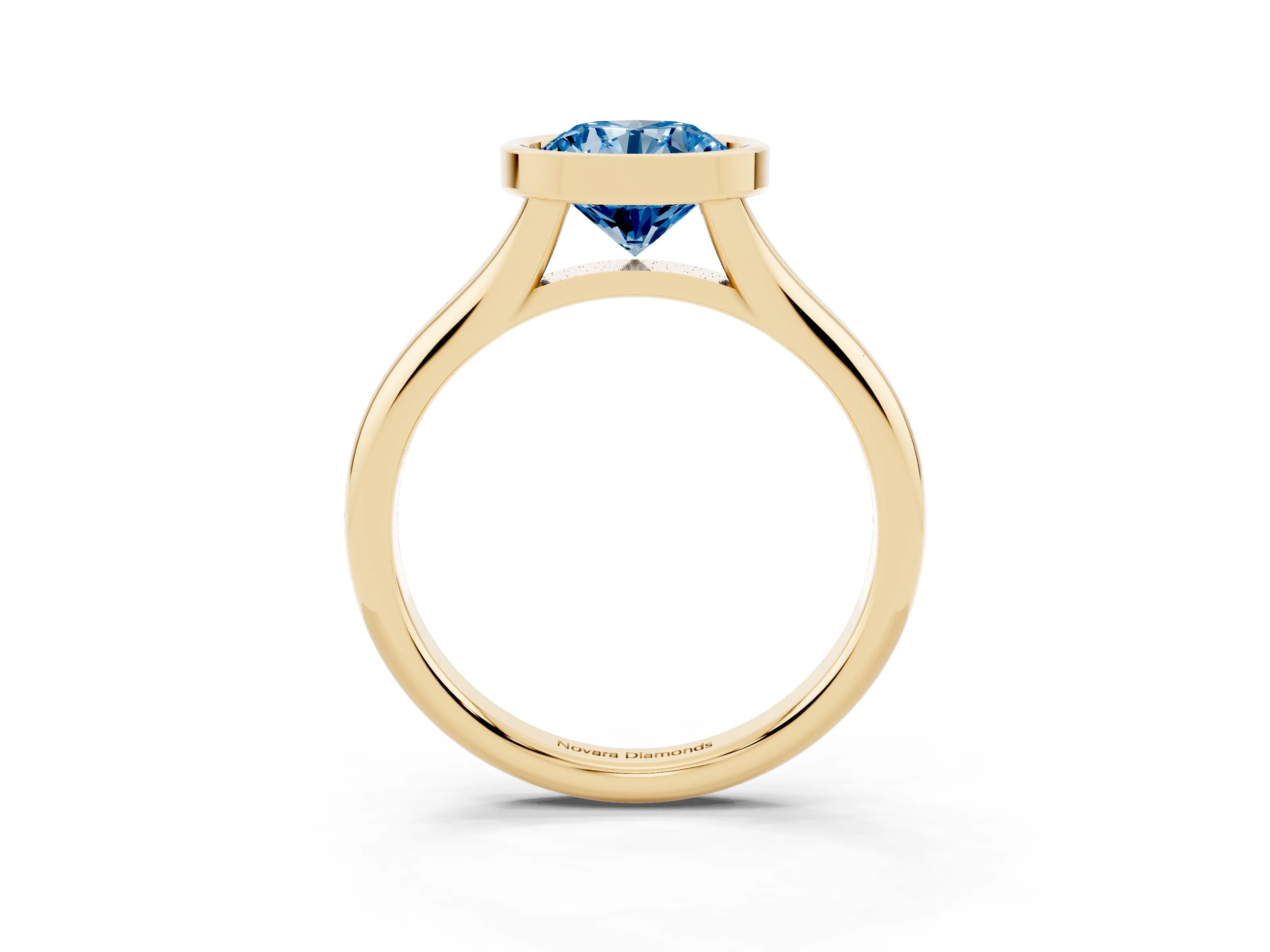 Fancy Blue Bezel Set Round Cut Diamond Solitaire Ring Set in Yellow gold with Smooth Band