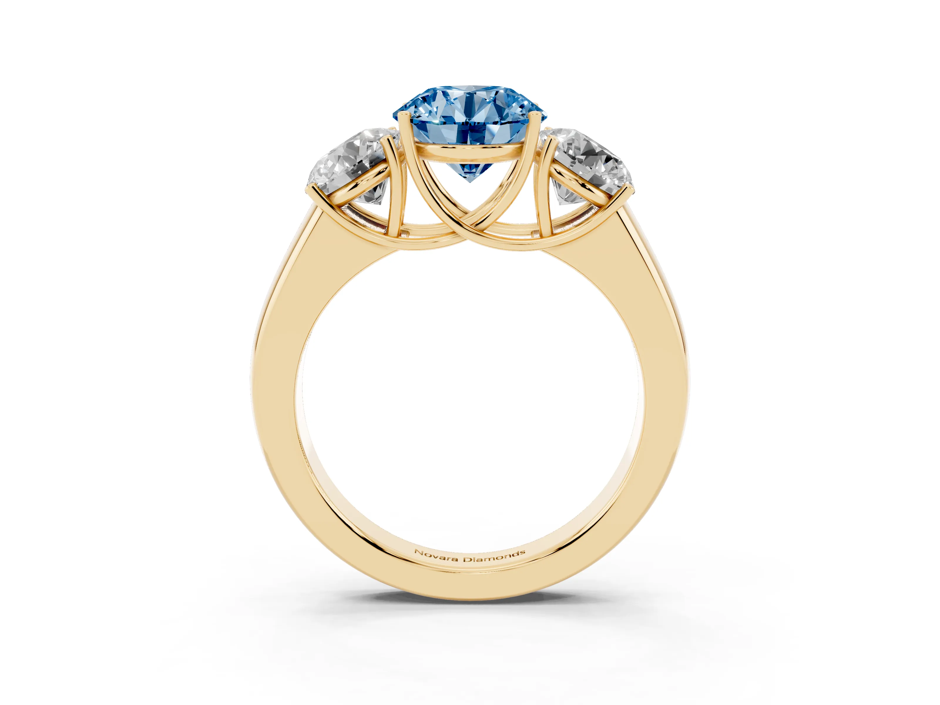 Fancy Blue Three-Stone Round Cut Diamond Ring Set in Yellow gold with Matching Prong Settings and Plain Band