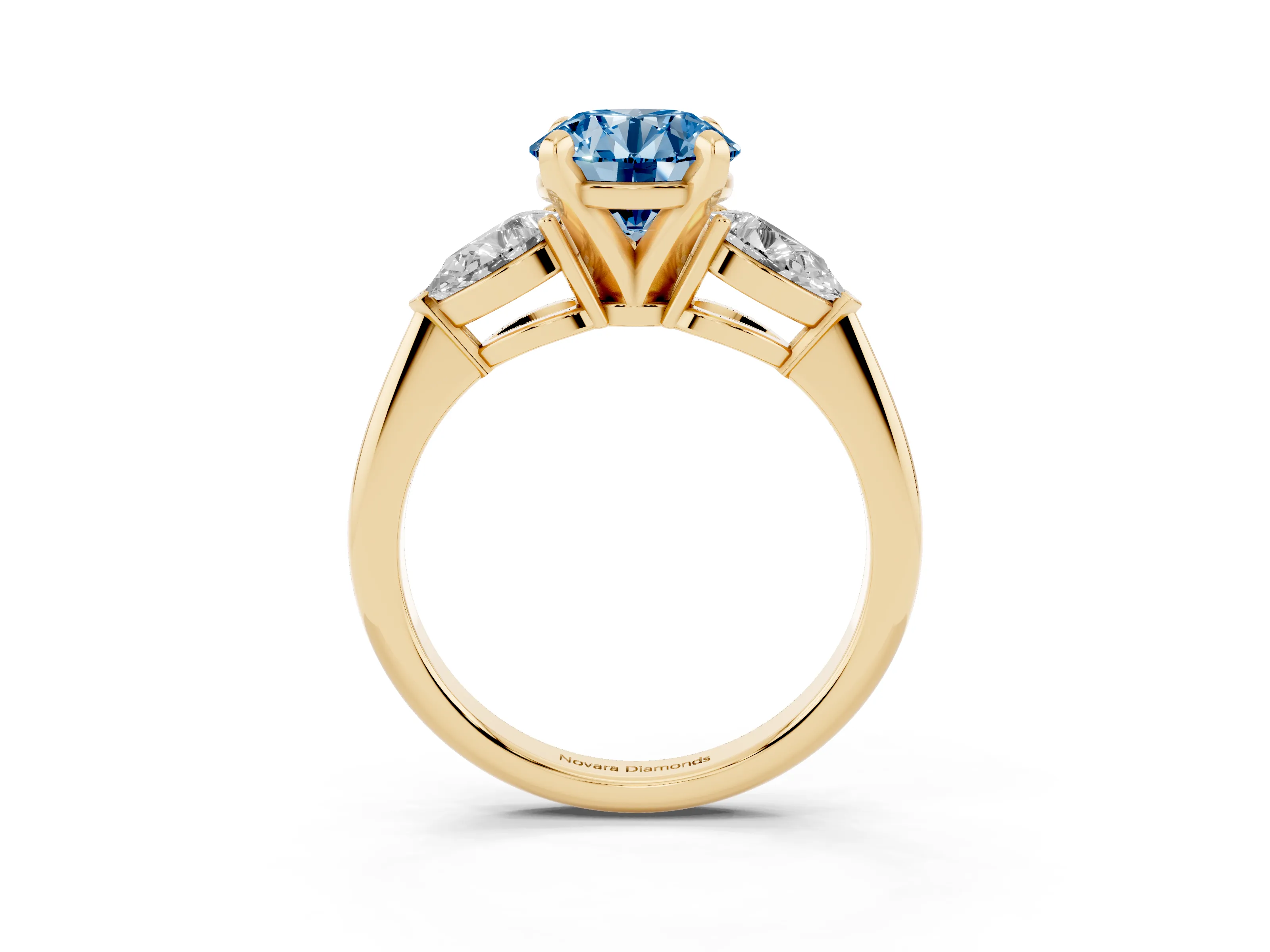 Fancy Blue Three-Stone Round Cut Diamond Ring Set in Yellow gold with Pear Side Stones and Prong Setting