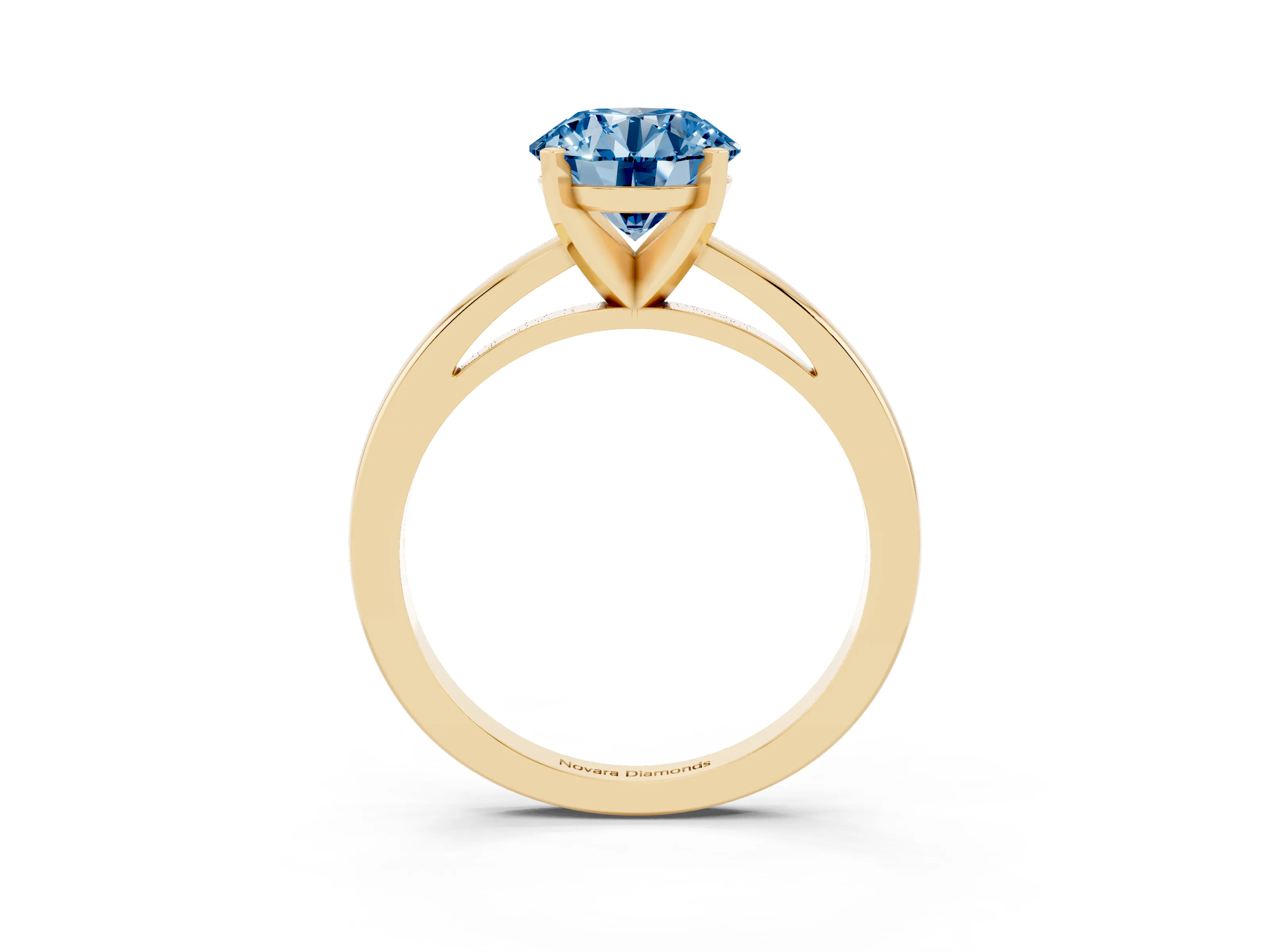 Fancy Blue Round Cut Diamond Solitaire Engagement Ring Set in Yellow gold with Prong Setting on a Classic Band