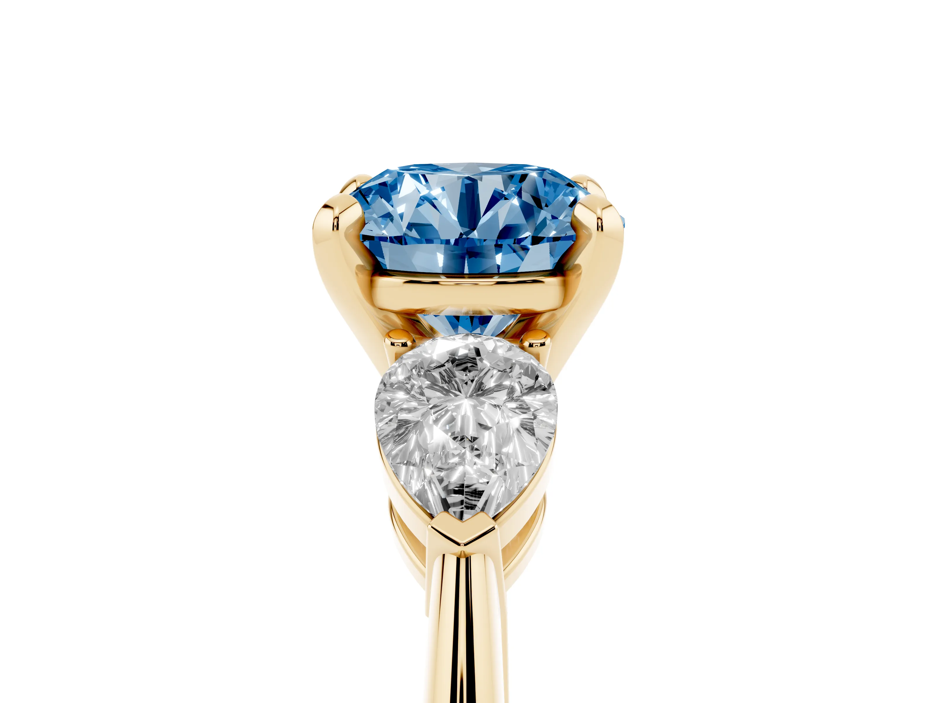 Fancy Blue Three-Stone Round Cut Diamond Ring Set in Yellow gold with Pear Side Stones and Prong Setting