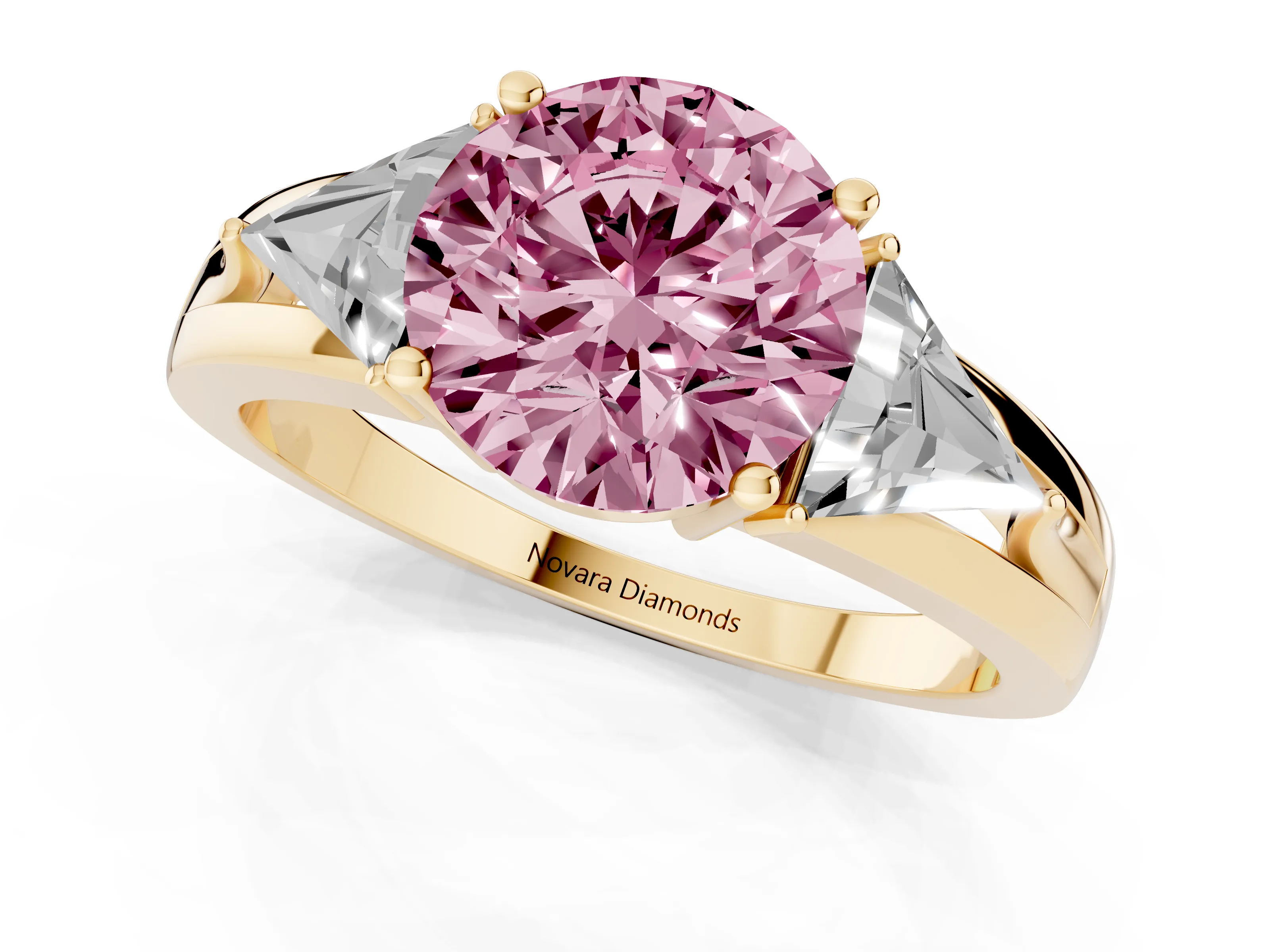 Fancy Pink Round Cut Diamond Three-Stone Ring Set in Yellow gold with Trillion Side Stones and Split Shank