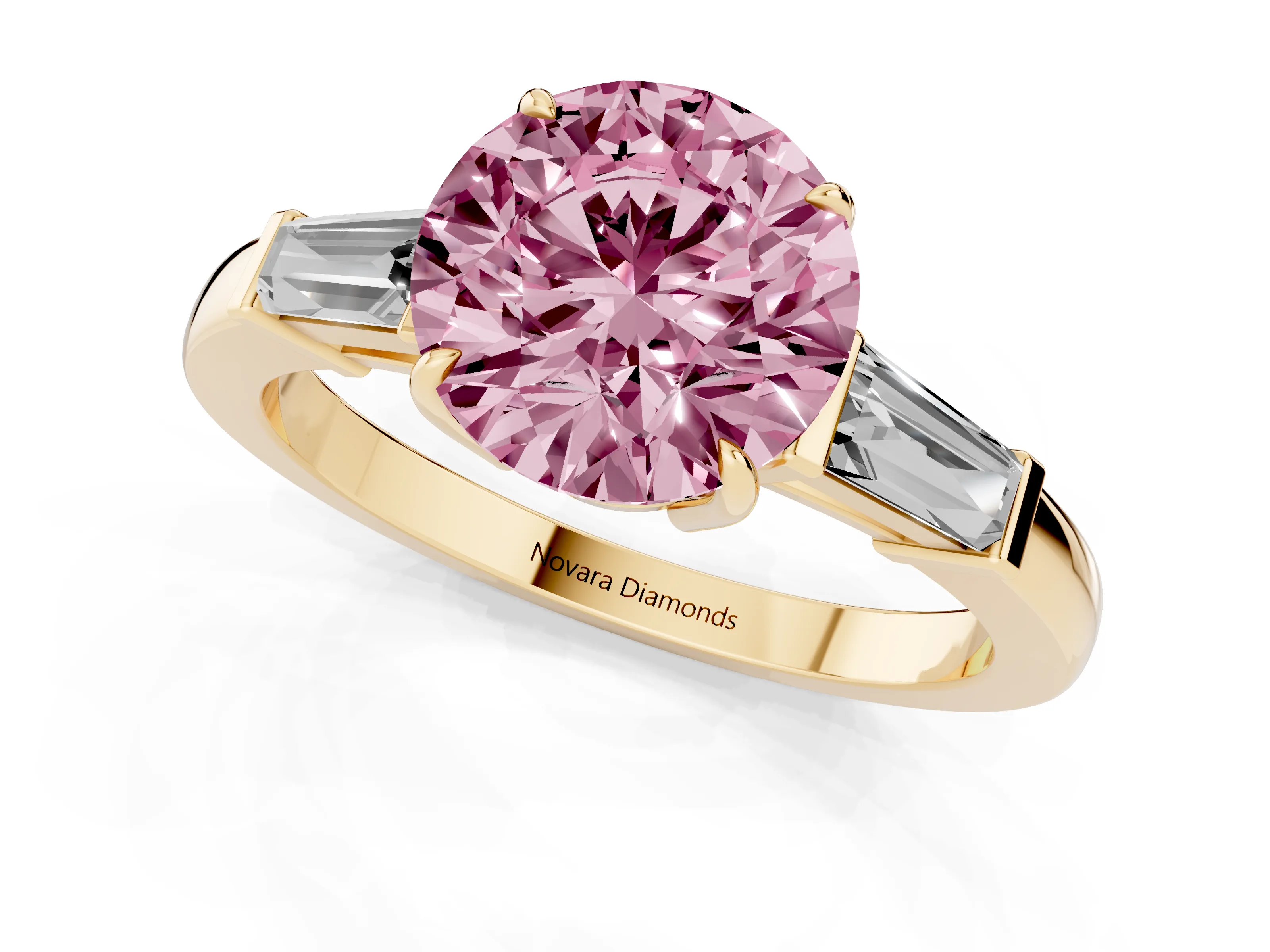 Fancy Pink Round Cut Diamond Three-Stone Ring Set in Yellow gold with Tapered Baguette Side Stones and Prong Setting