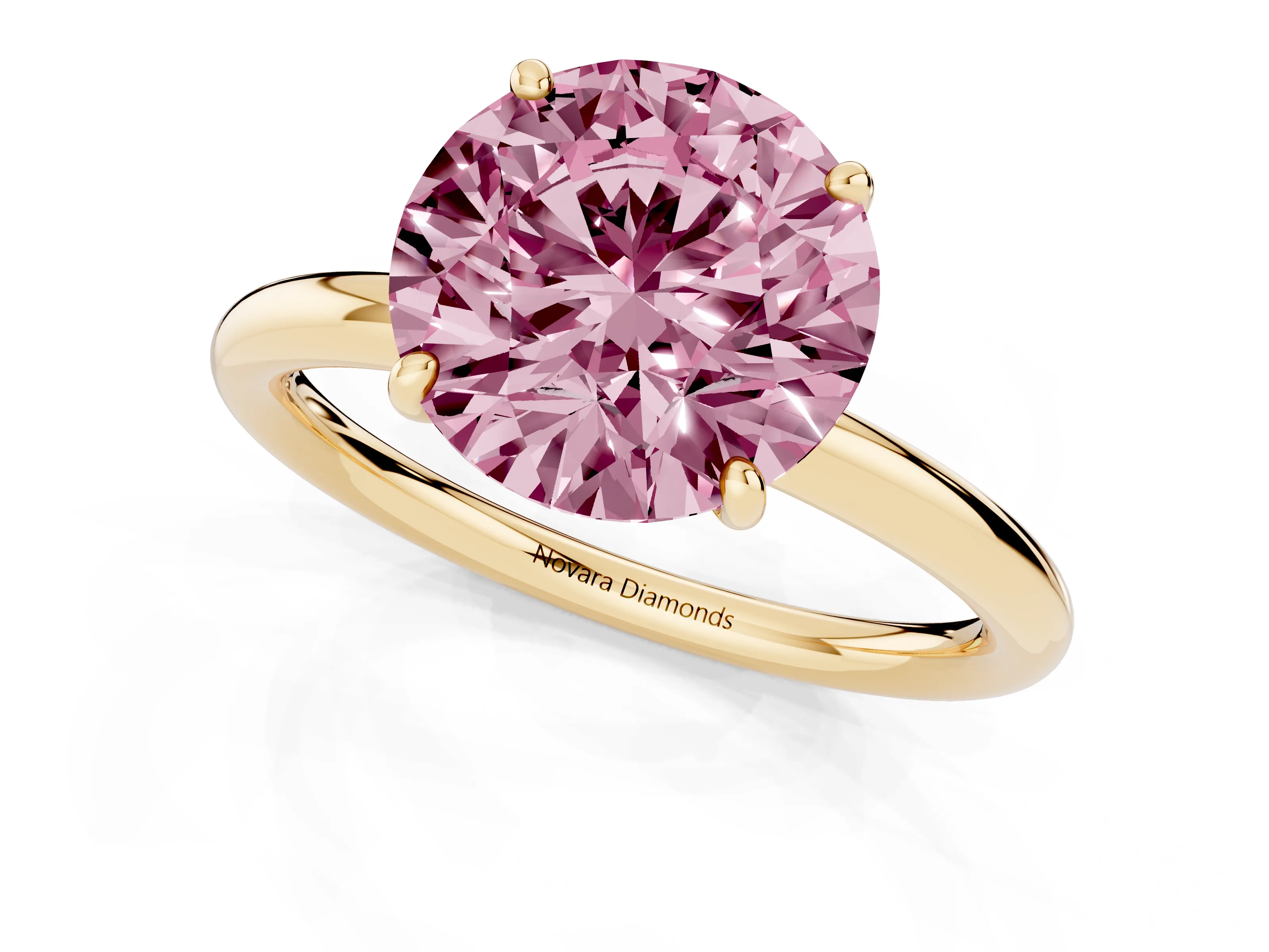 Fancy Pink Round Cut Diamond Solitaire Ring Set in Yellow gold with Prong Setting on a Polished Plain Band