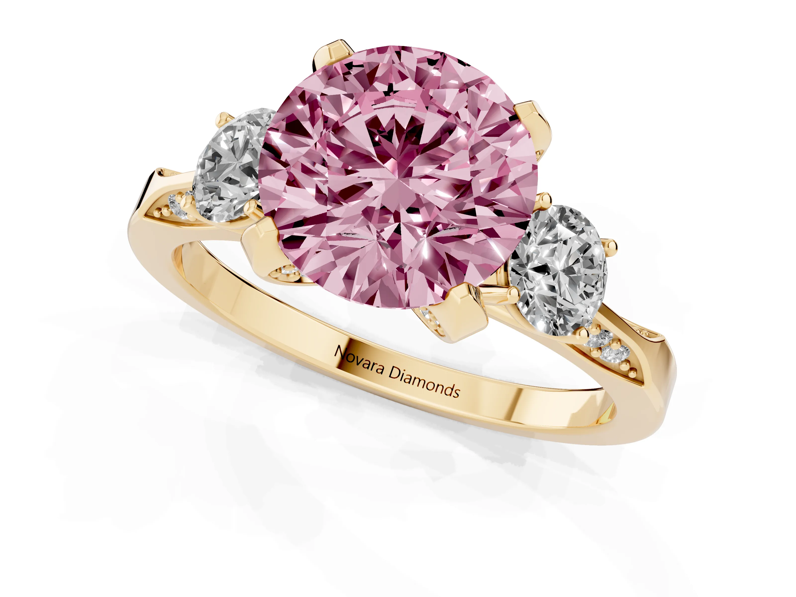 Fancy Pink Round Cut Diamond Three-Stone Ring Set in Yellow gold with Pavé Band and Smaller Side Stones
