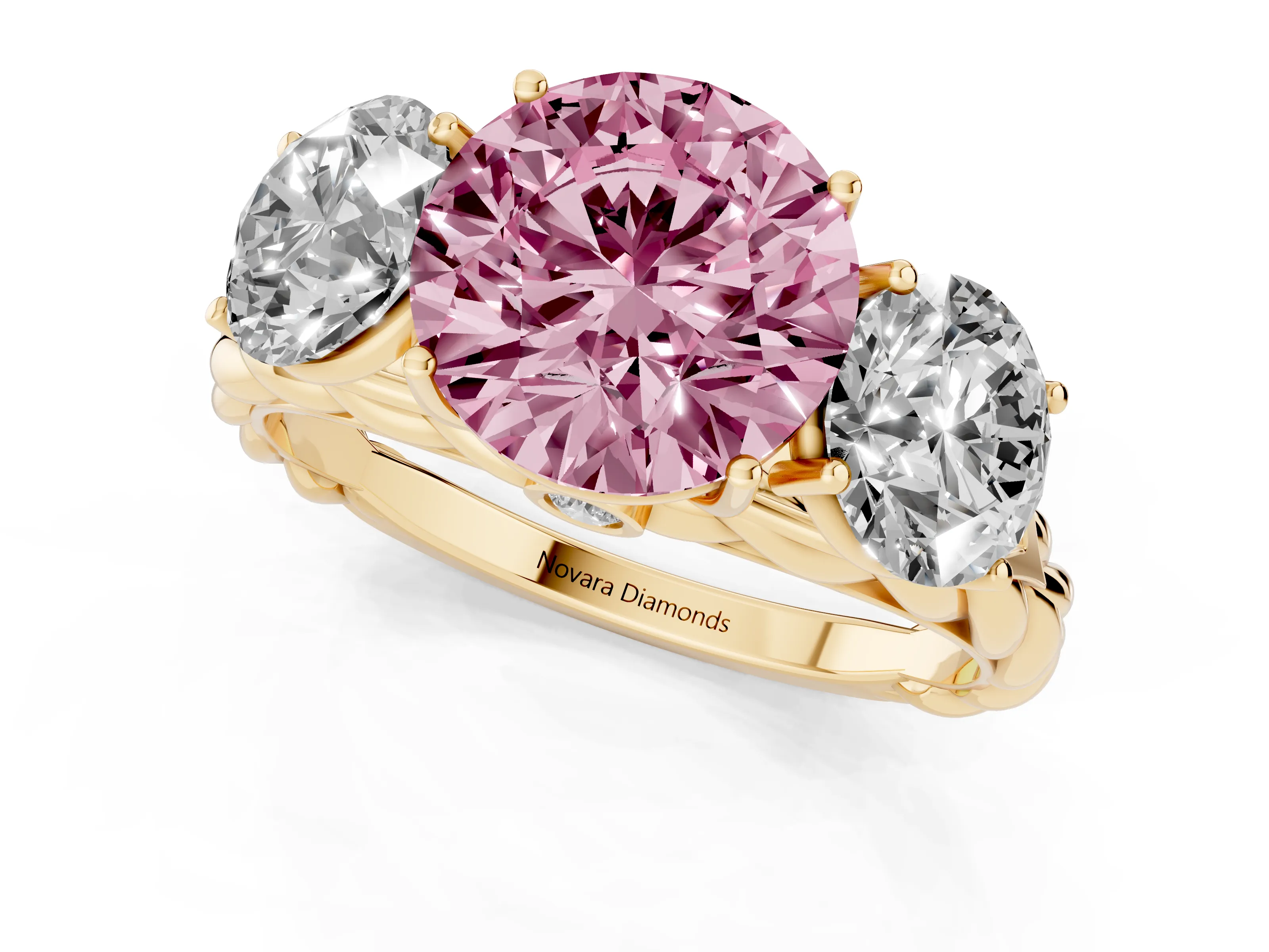 Fancy Pink Round Cut Diamond Three-Stone Ring Set in Yellow gold with Braided Band