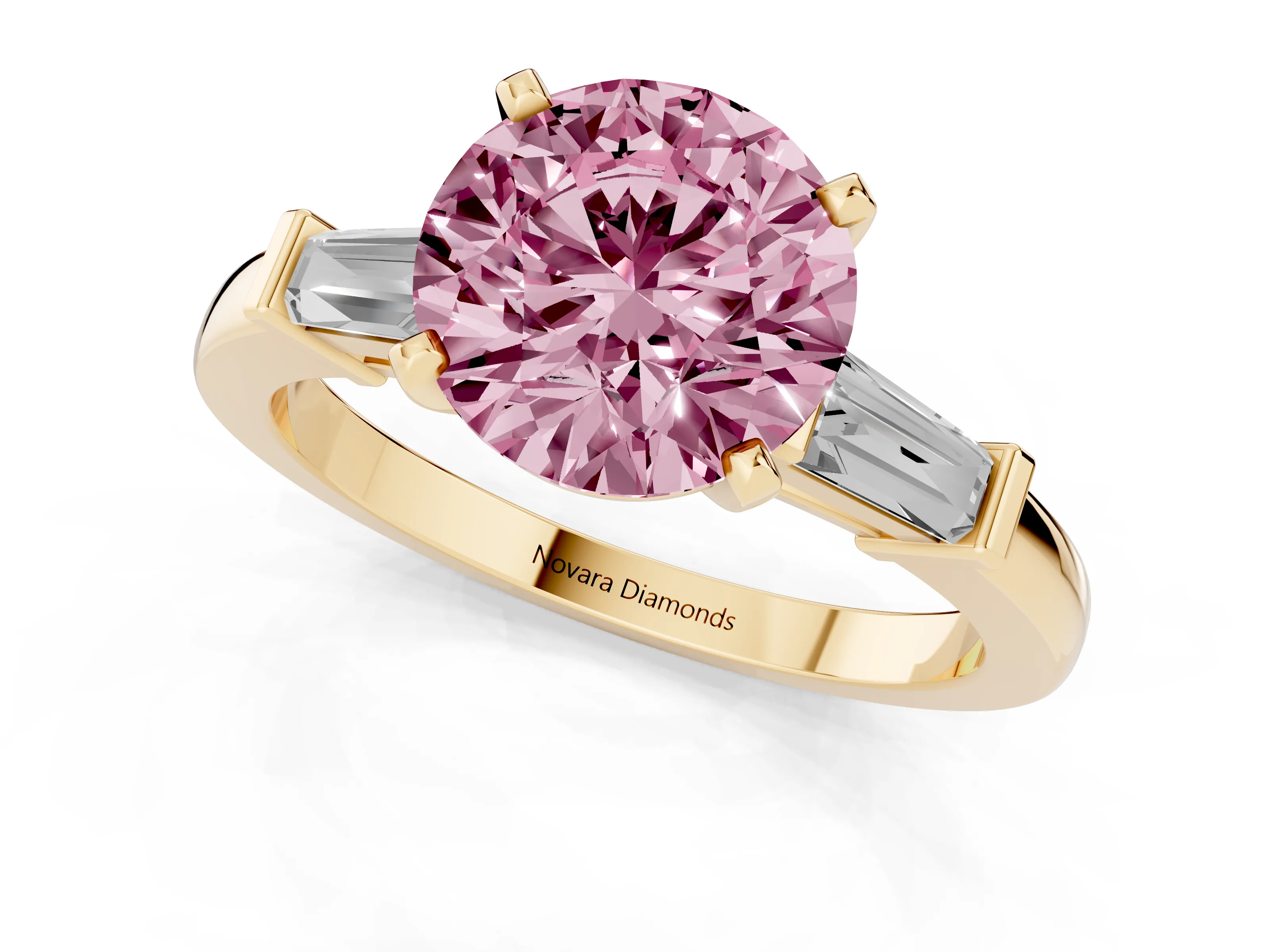 Fancy Pink Round Cut Diamond Solitaire Ring Set in Yellow gold with Tapered Baguette Accents and Prong Setting