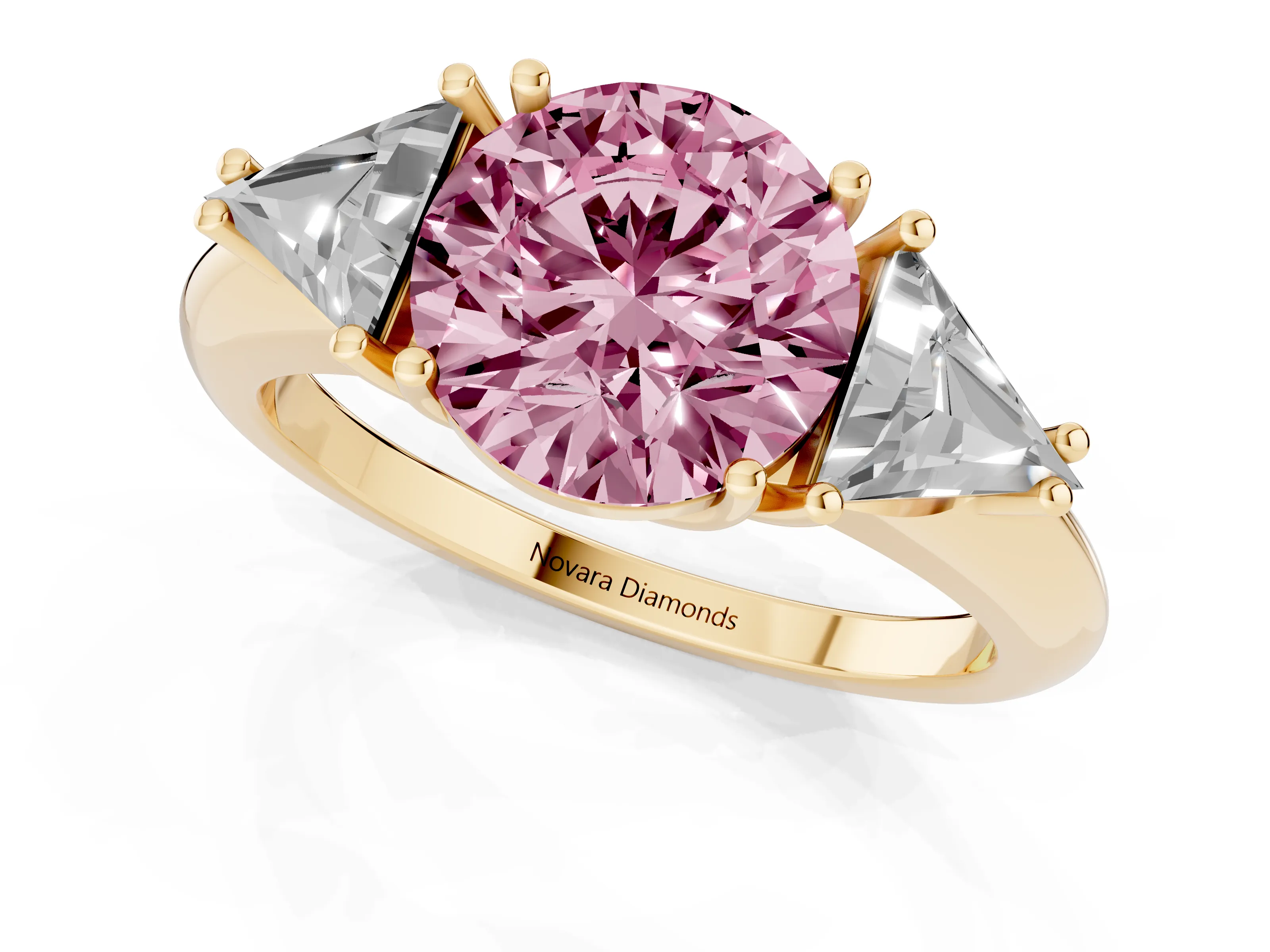Fancy Pink Round Cut Diamond Three-Stone Engagement Ring Set in Yellow gold with Trillion Side Stones