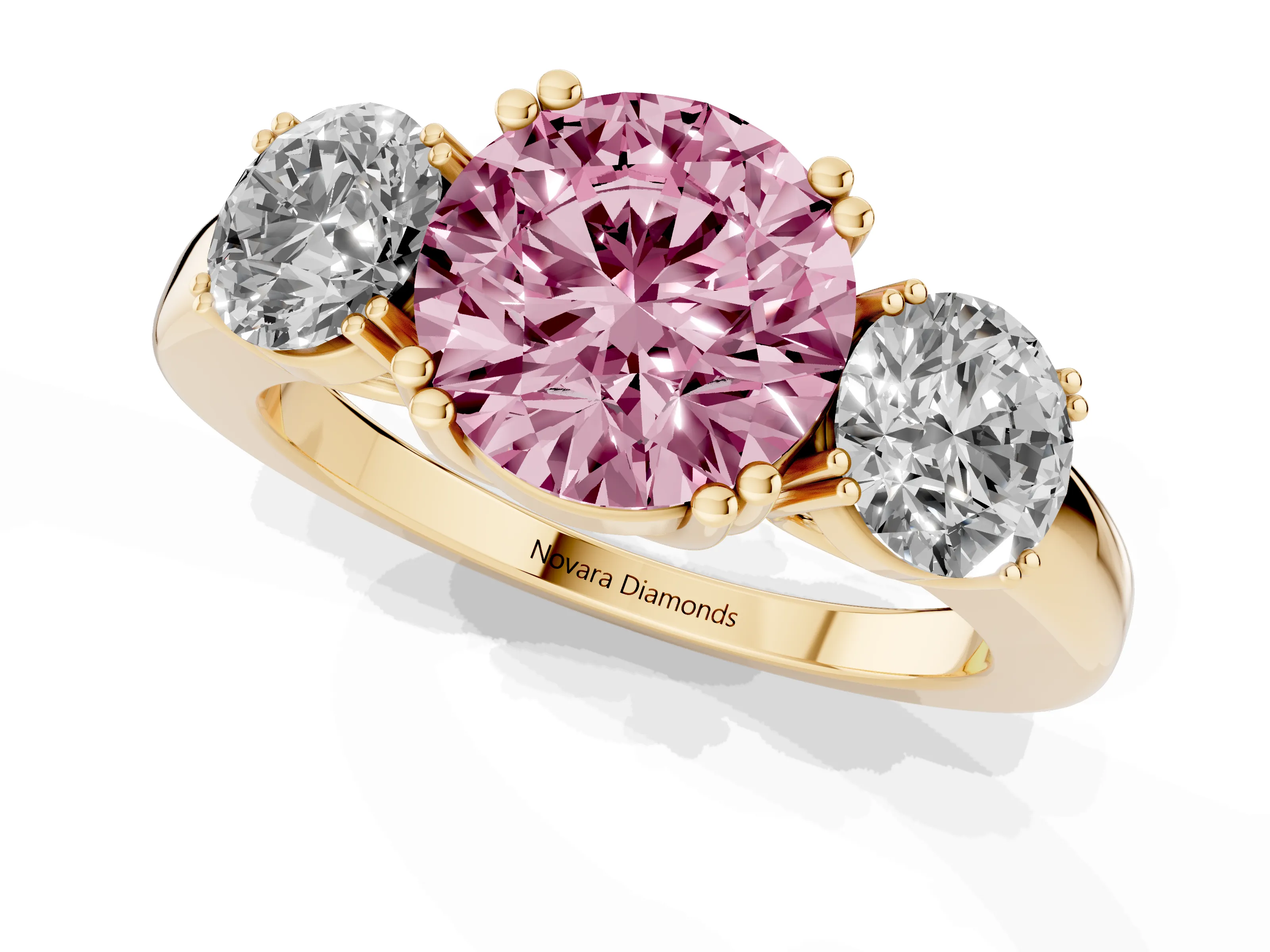 Fancy Pink Round Cut Diamond Three-Stone Ring Set in Yellow gold with Polished Channel-Set Band