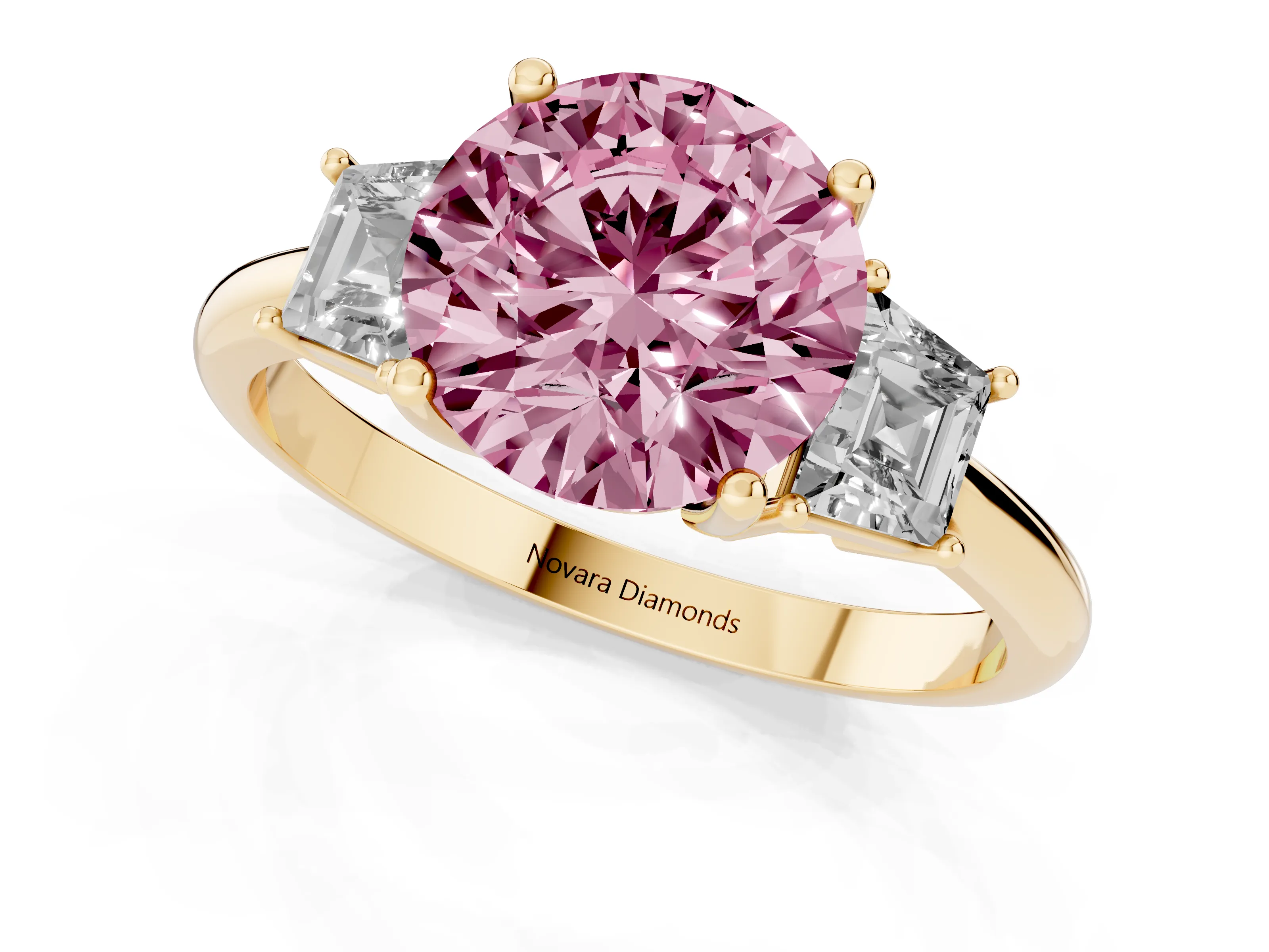 Fancy Pink Round Cut Diamond Three-Stone Ring Set in Yellow gold with Trapezoid Side Stones and Prong Setting