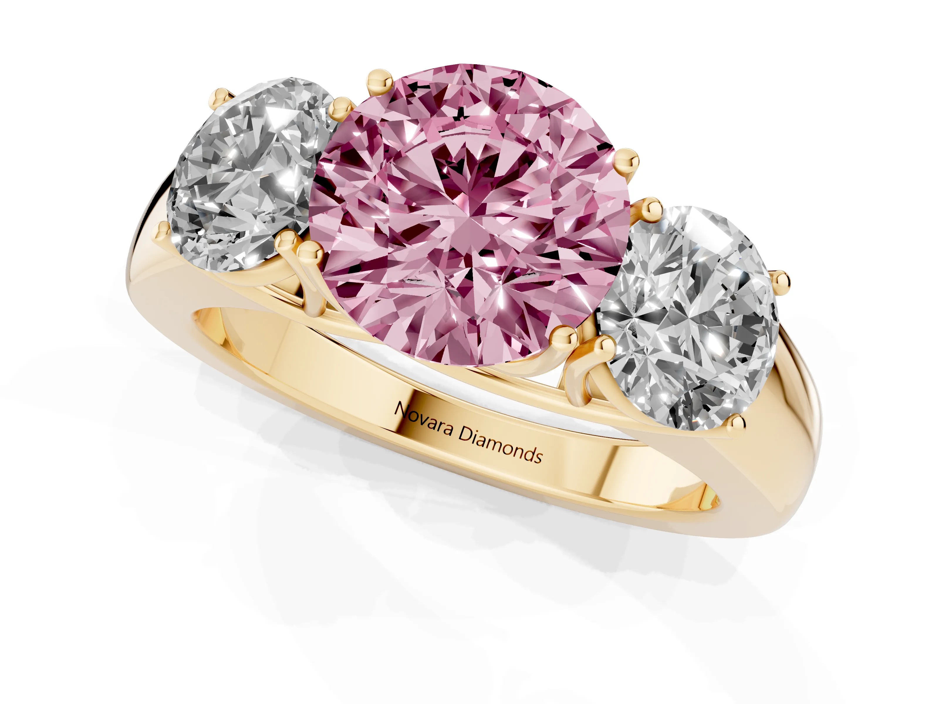 Fancy Pink Three-Stone Round Cut Diamond Ring Set in Yellow gold with Matching Prong Settings and Plain Band