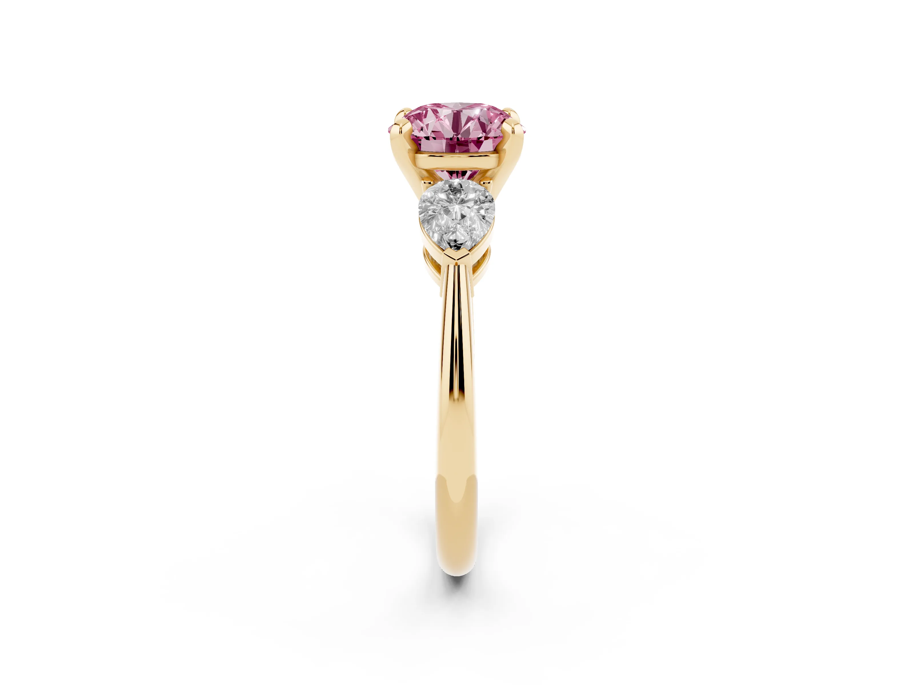 Fancy Pink Three-Stone Round Cut Diamond Ring Set in Yellow gold with Pear Side Stones and Prong Setting
