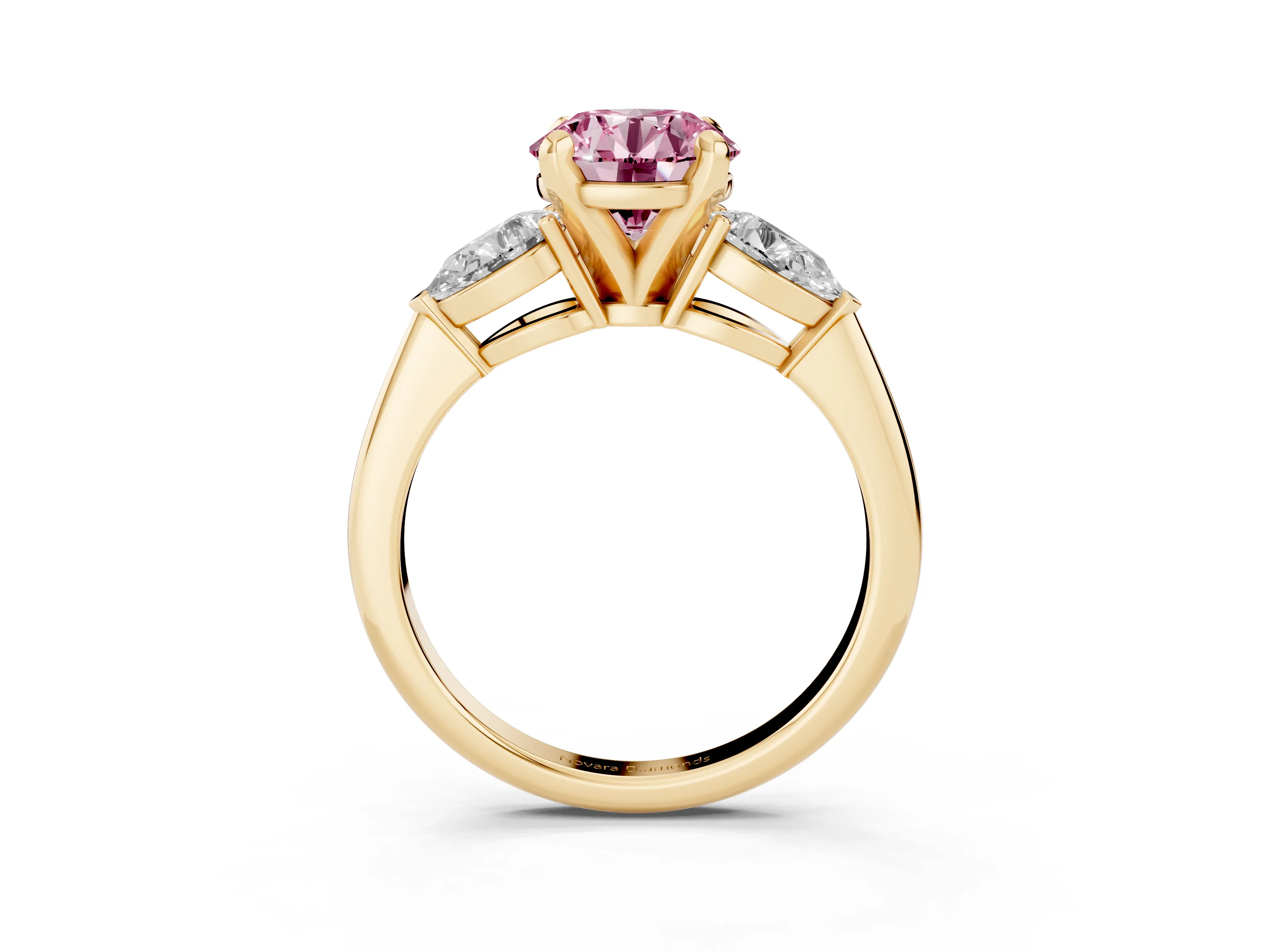 Fancy Pink Three-Stone Round Cut Diamond Ring Set in Yellow gold with Pear Side Stones and Prong Setting