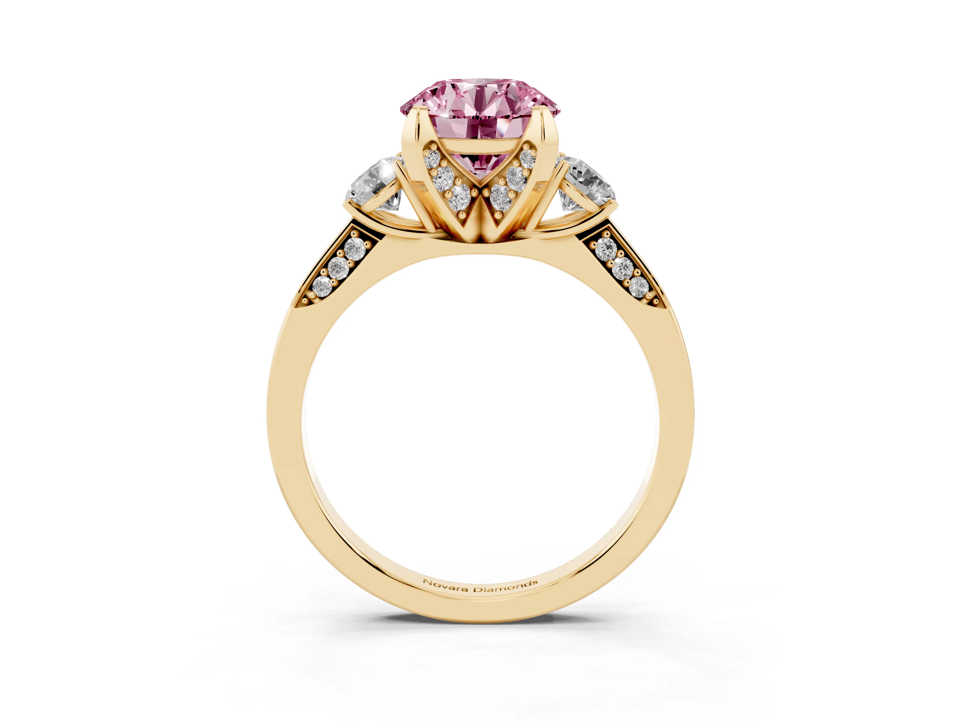 Fancy Pink Round Cut Diamond Three-Stone Ring Set in Yellow gold with Pavé Band and Smaller Side Stones