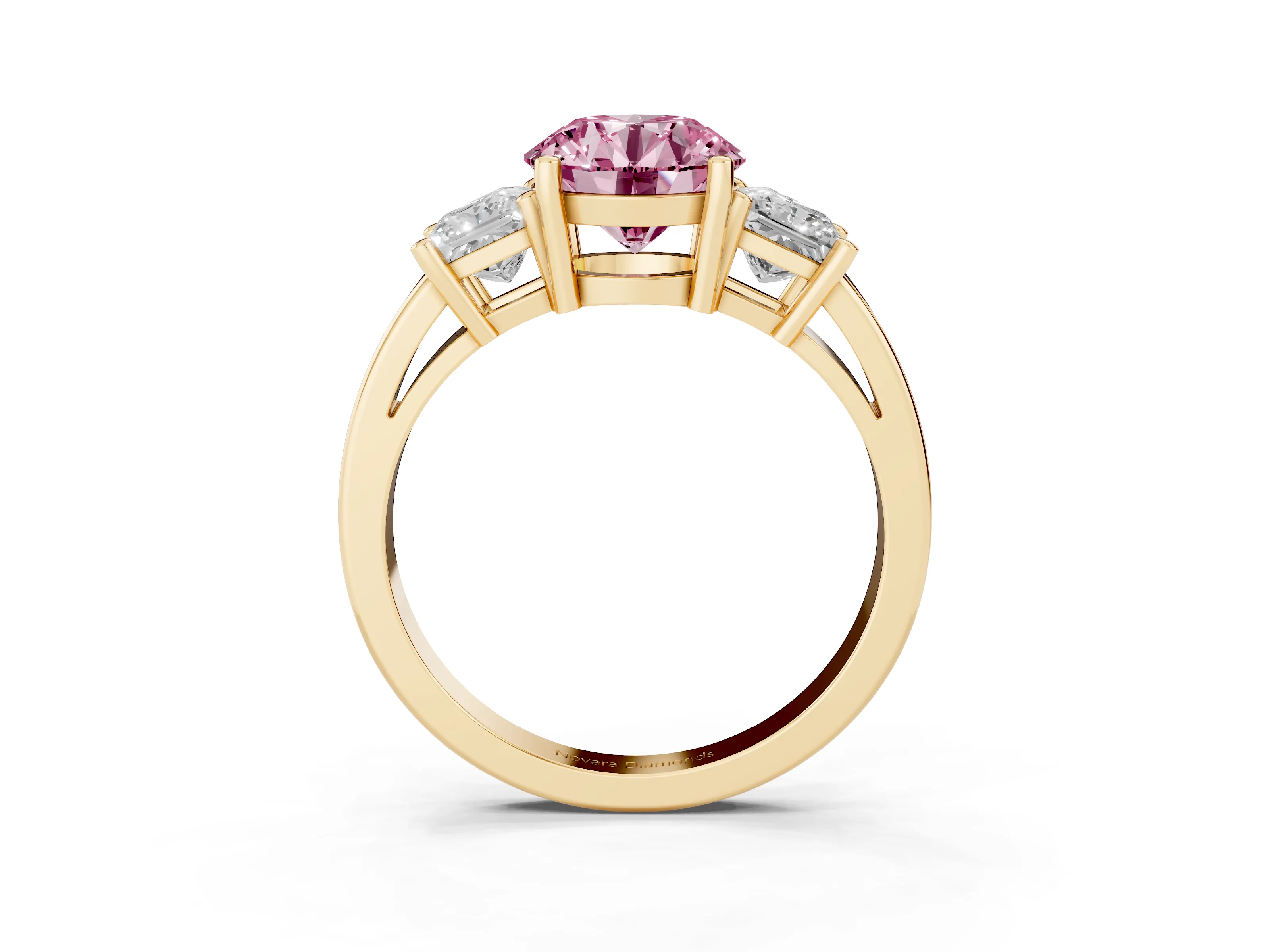 Fancy Pink Three-Stone Round Cut Diamond Solitaire Ring Set in Yellow gold with Prong Setting