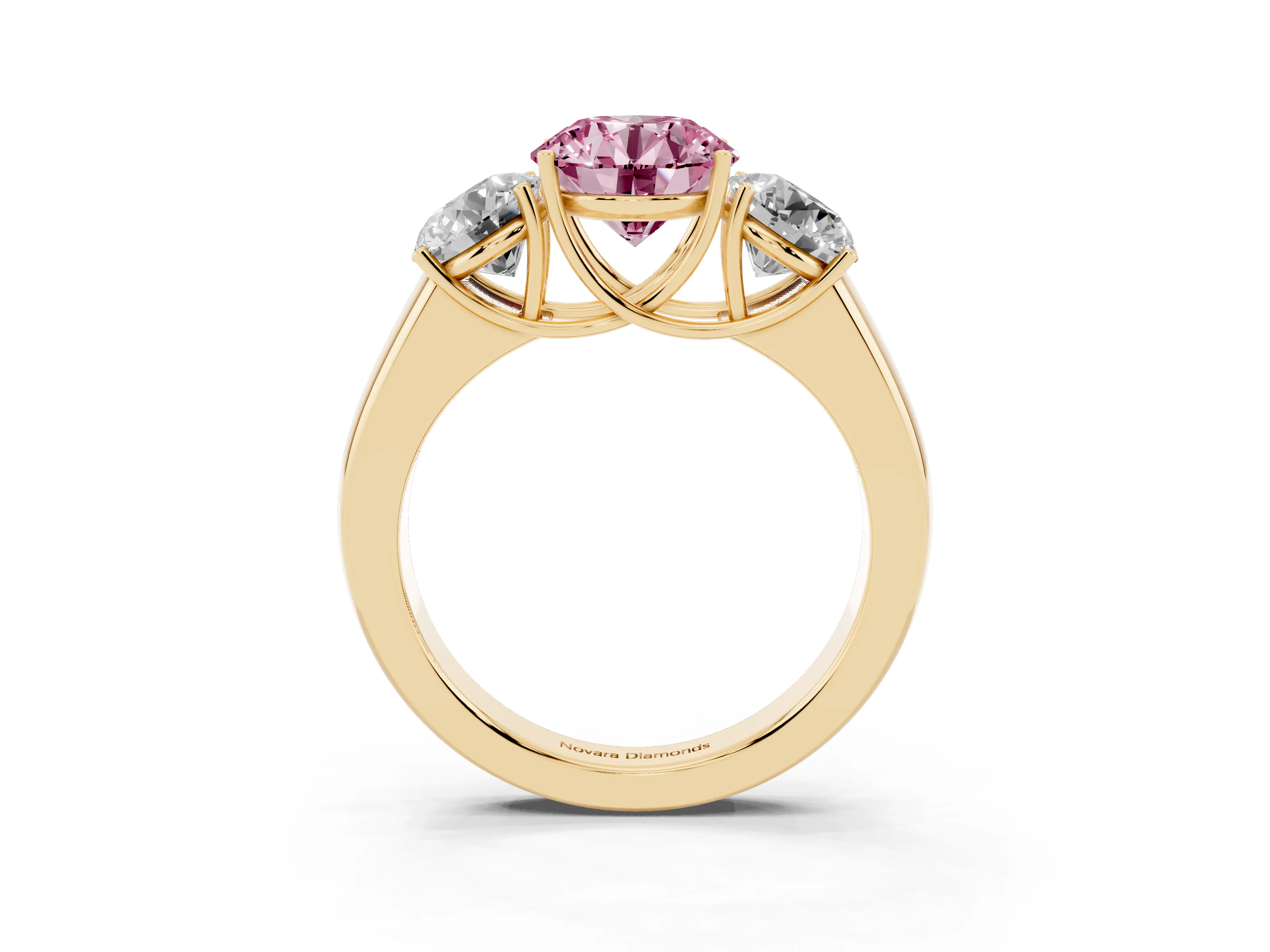 Fancy Pink Three-Stone Round Cut Diamond Ring Set in Yellow gold with Matching Prong Settings and Plain Band