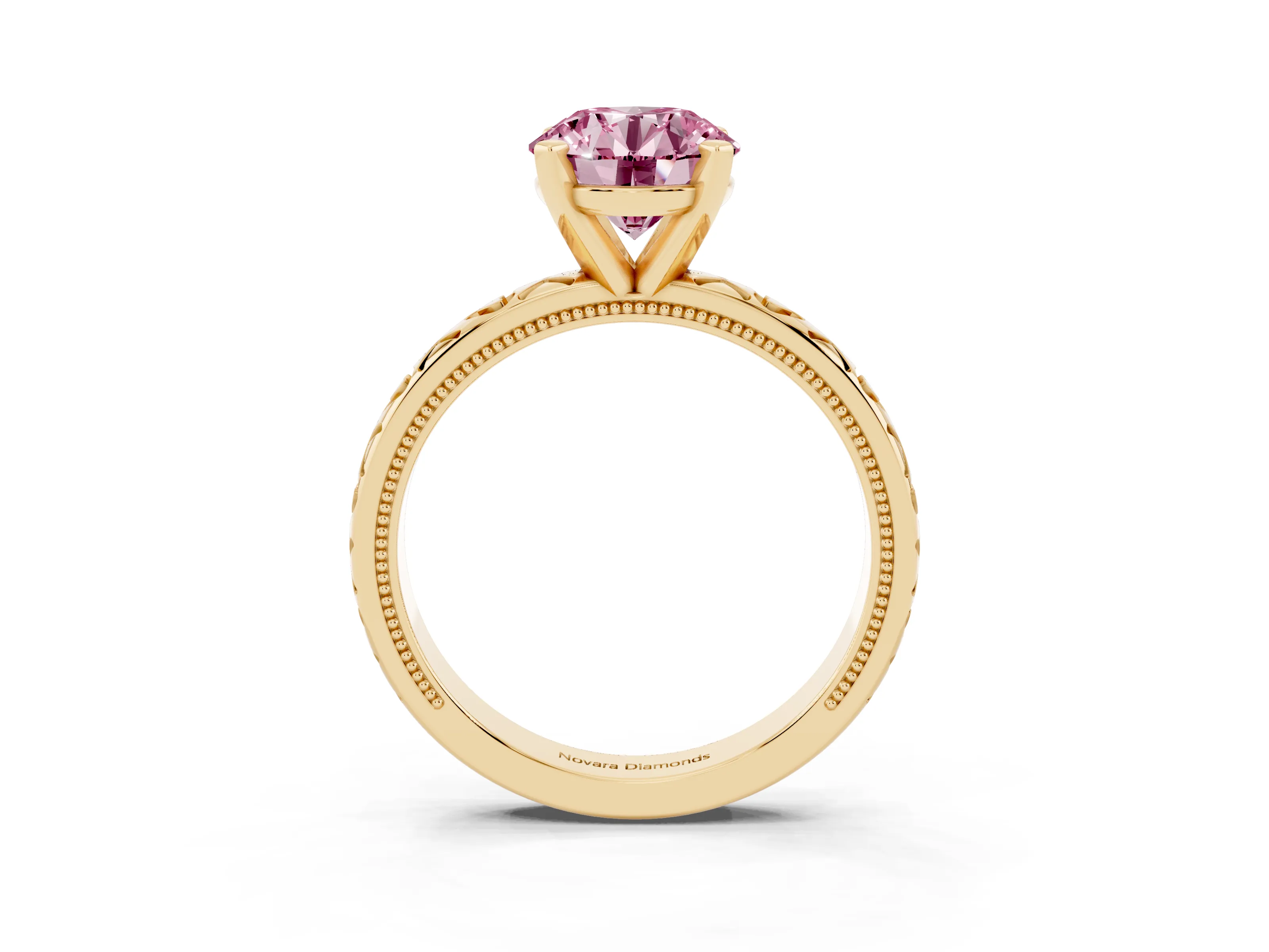 Fancy Pink Round Cut Diamond Solitaire Engagement Ring Set in Yellow gold with XO Engraved Band and Prong Setting