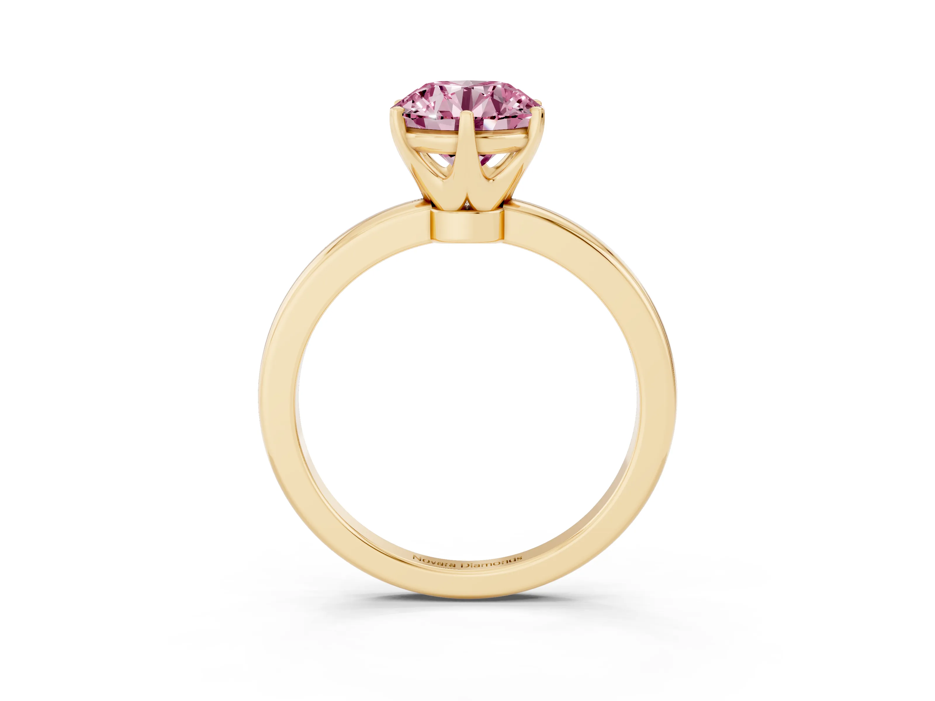 Fancy Pink Round Cut Diamond Solitaire Ring Set in Yellow gold with Raised Prong Setting on a Classic Band